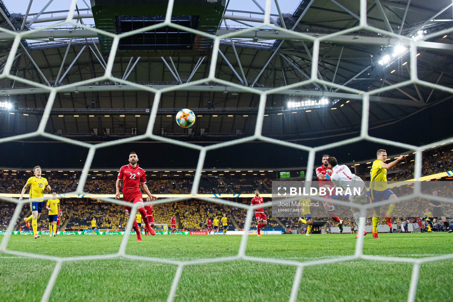 Viktor Claesson of Sweden scores 2-0 behind goalkeeper