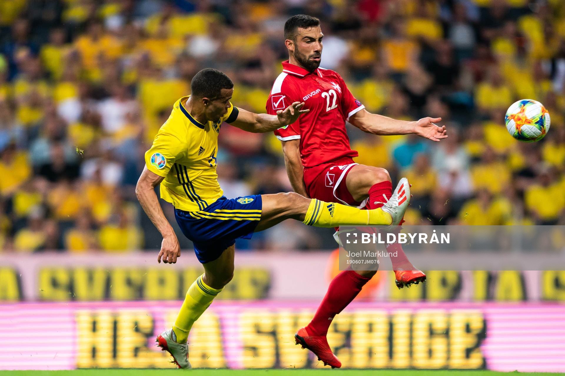 Robin Quaison of Sweden and Alfred Effiong of Malta