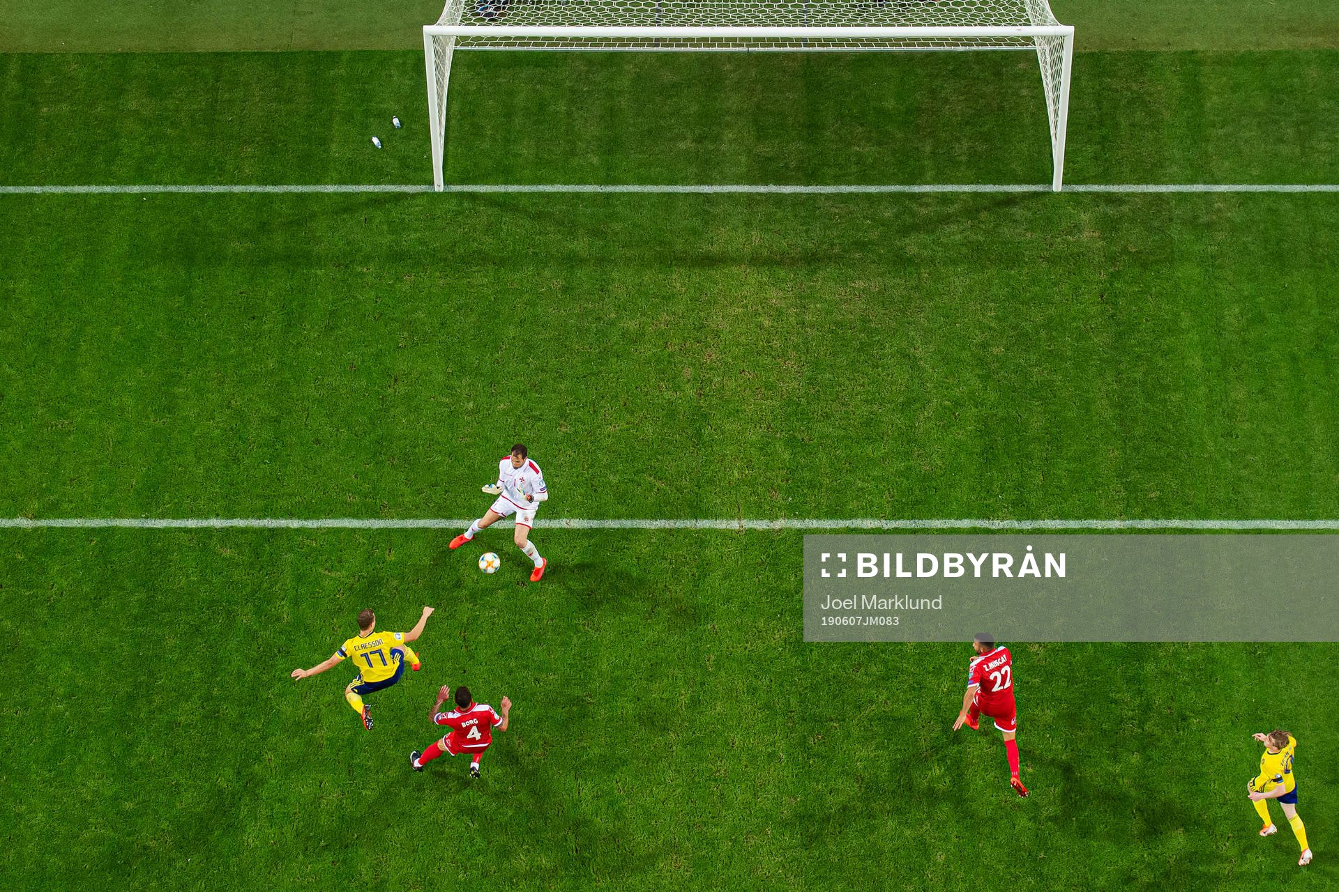 Viktor Claesson of Sweden scores 2-0 behind goalkeeper