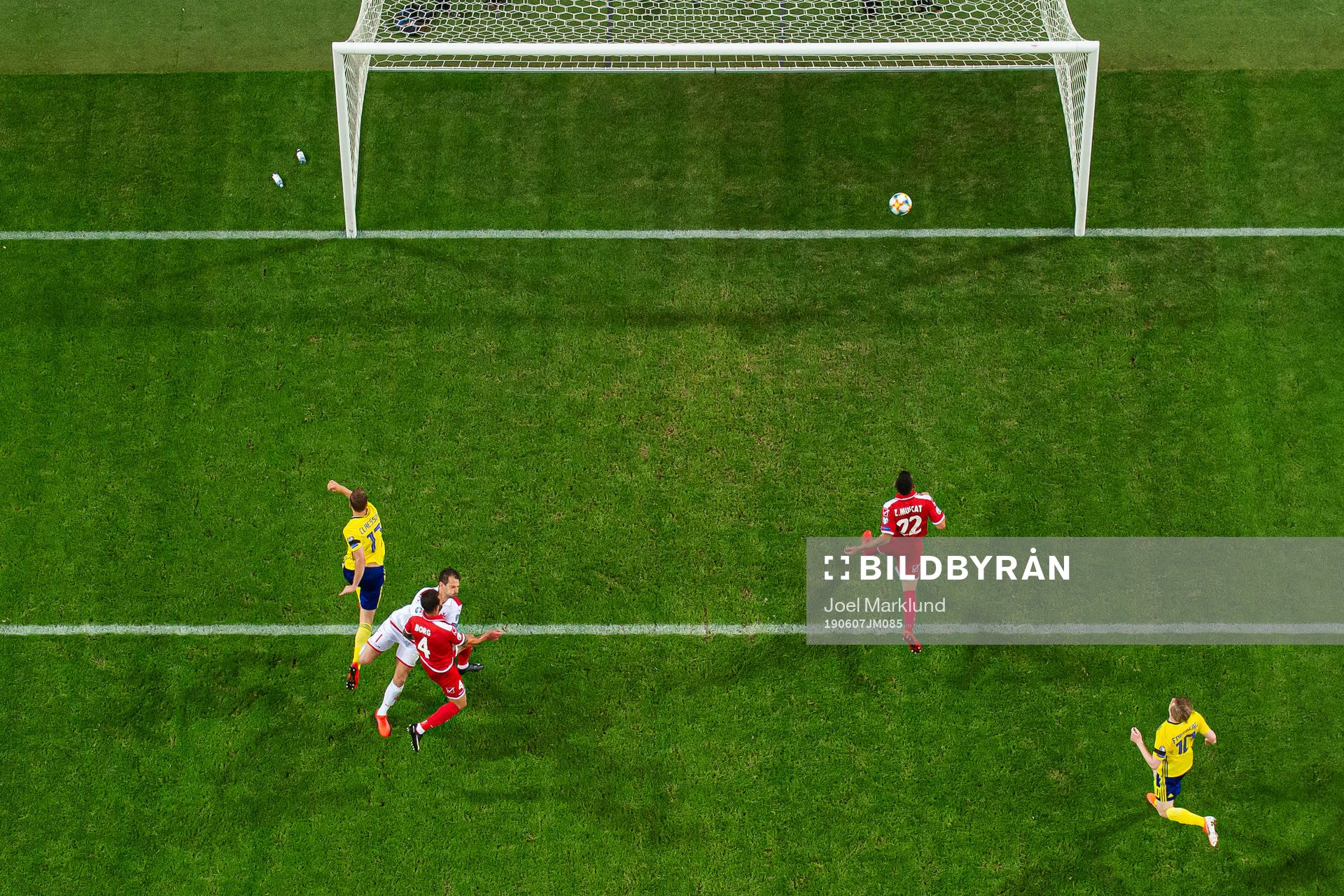 Viktor Claesson of Sweden scores 2-0 behind goalkeeper