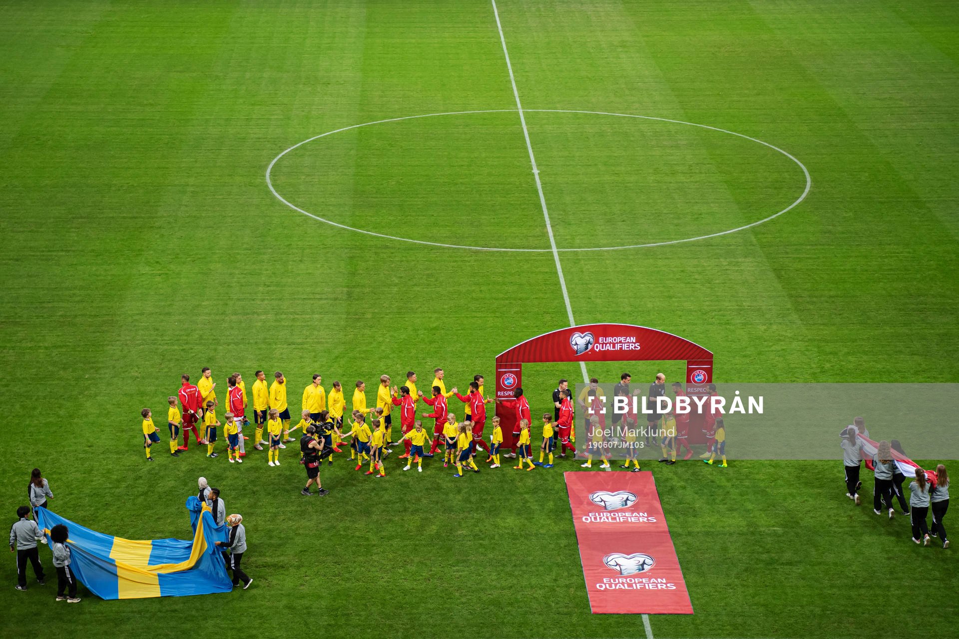 Players of Sweden and Malta greet each other