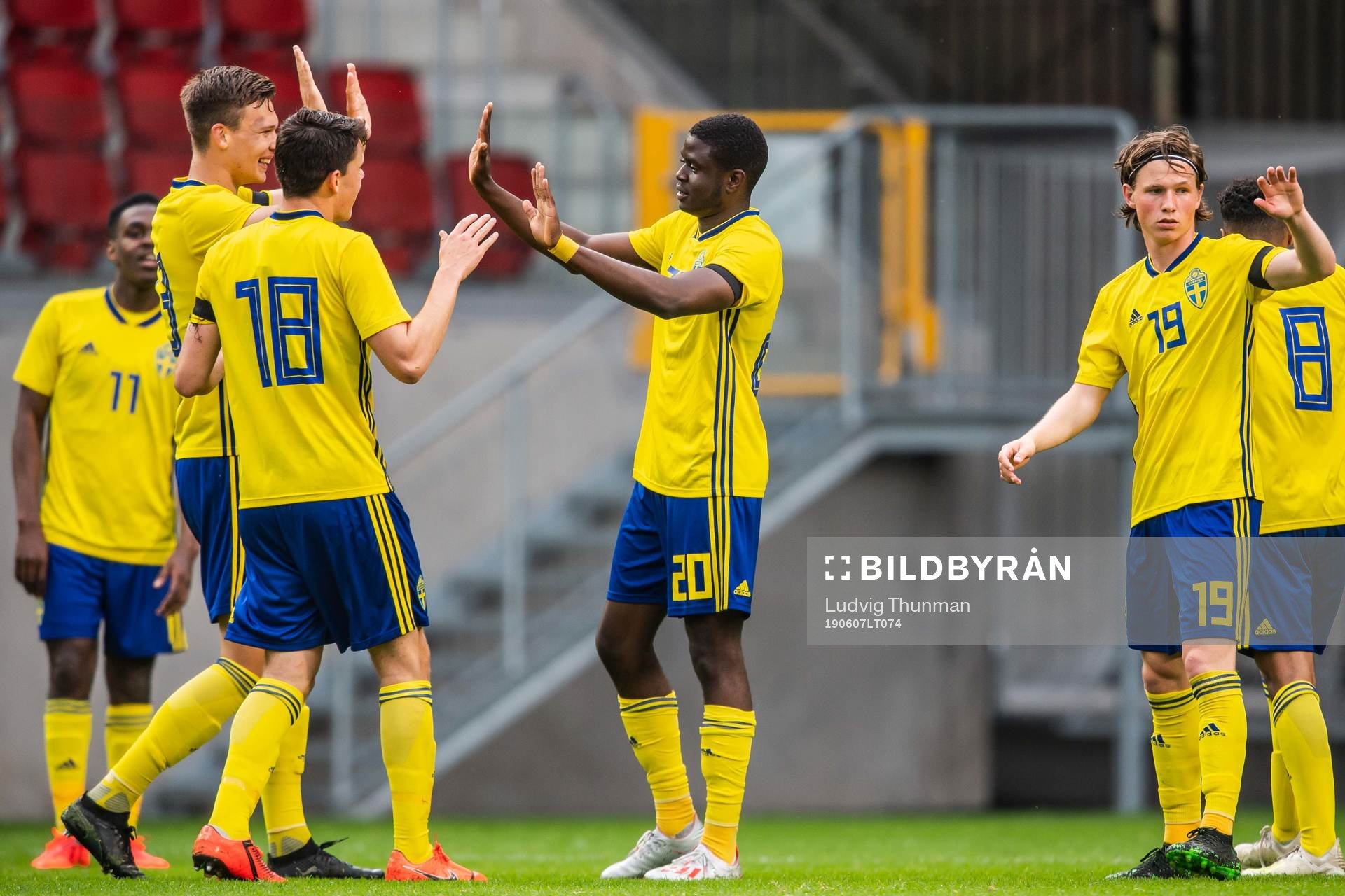 Benjamin Mbunga Kimpioka celebrate with Samuel Adrian and