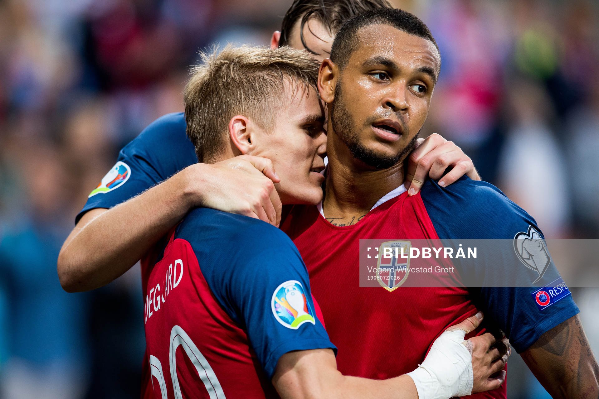 Martin Ødegaard of Norway celebrates with teammate Joshua