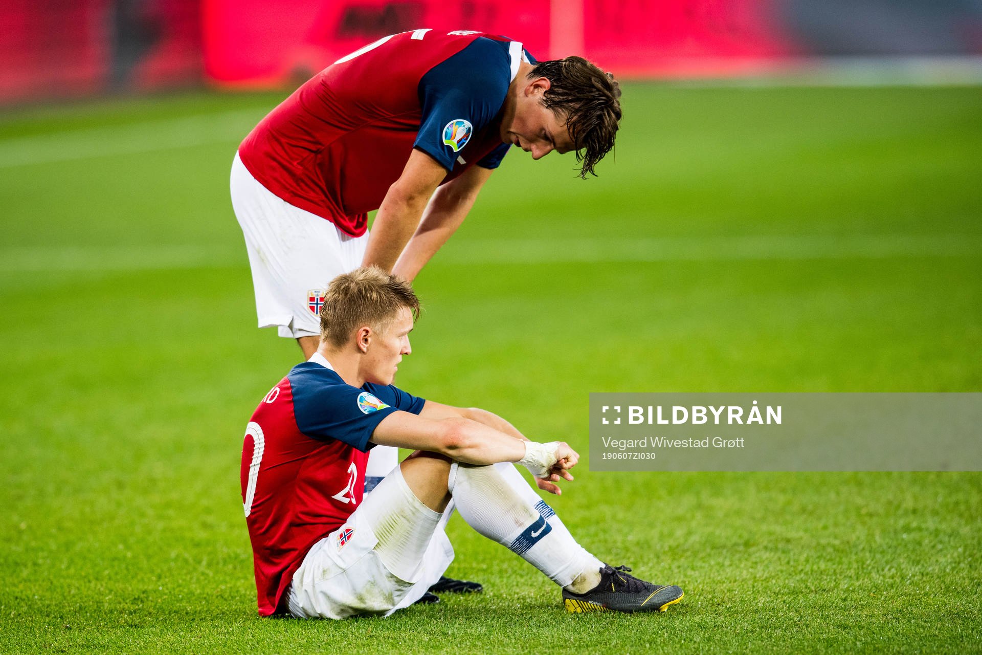 Sander Berge and Martin Ødegaard of Norway looks dejected