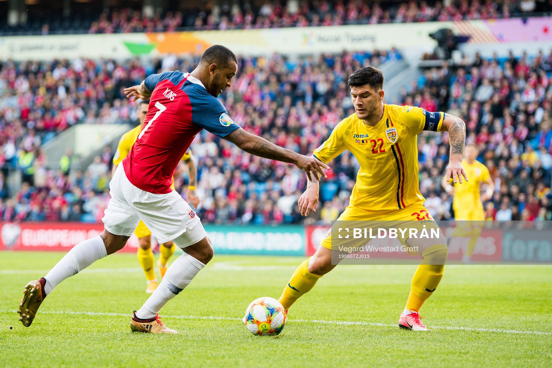 Joshua King of Norway and Cristian Sapunaru of Romania