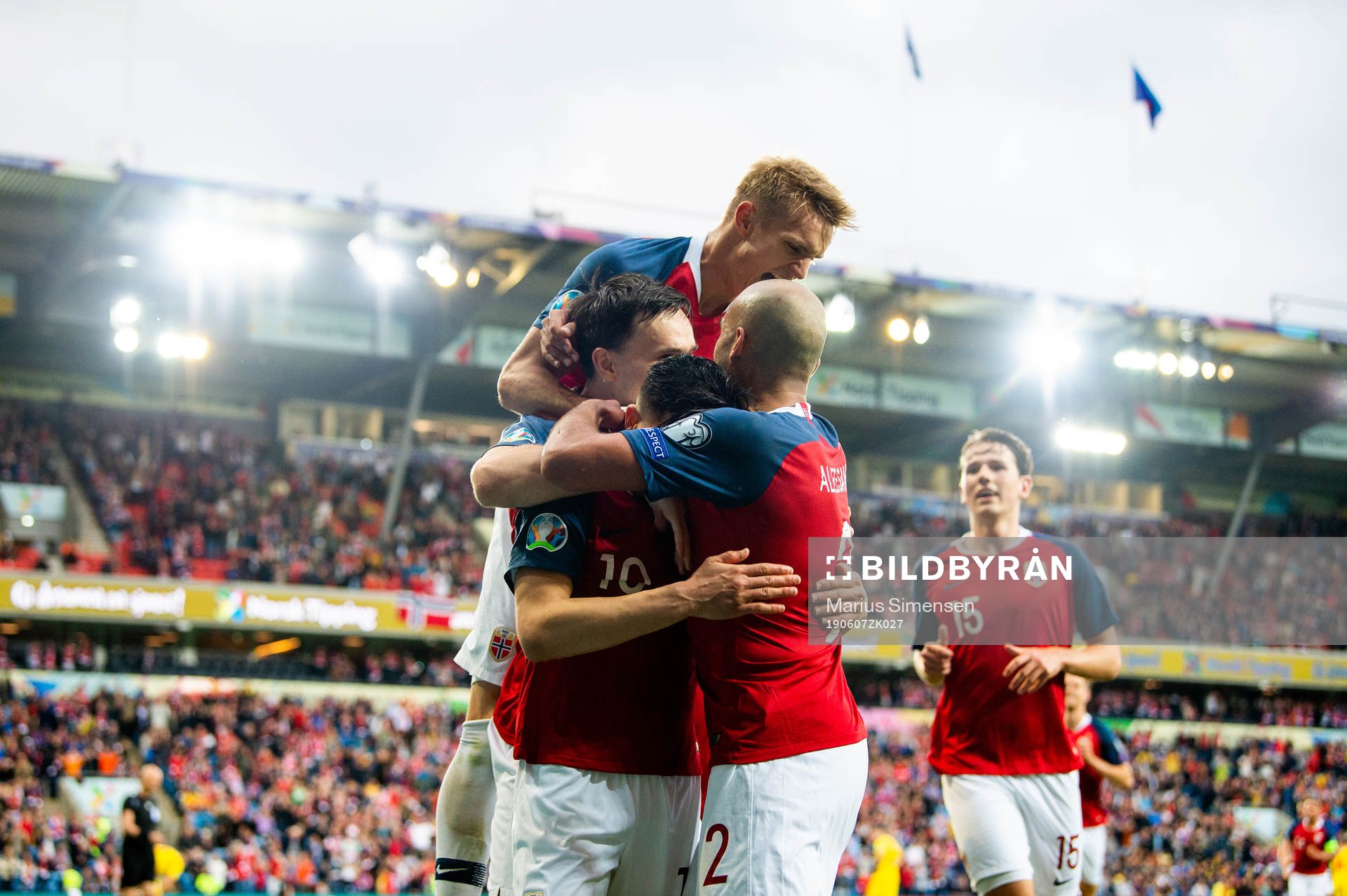 Tarik Elyounoussi of Norway celebrates with his teammates