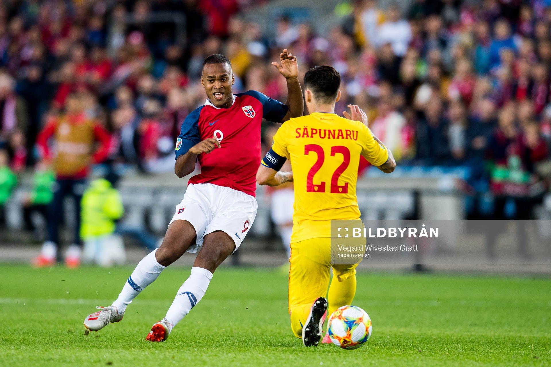Ola Kamara of Norway and Cristian Sapunaru of Romania