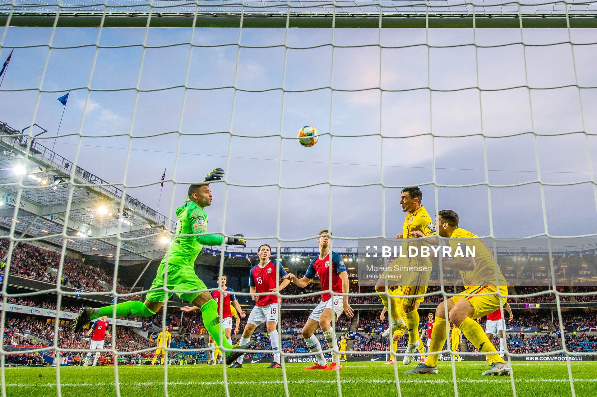 Claudiu Keseru of Romania scores the 2-1 goal