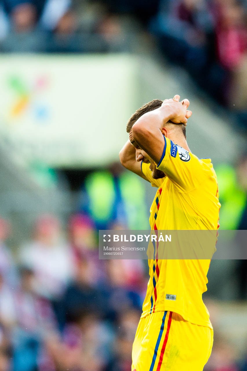 George Puscas of Romania looks dejected