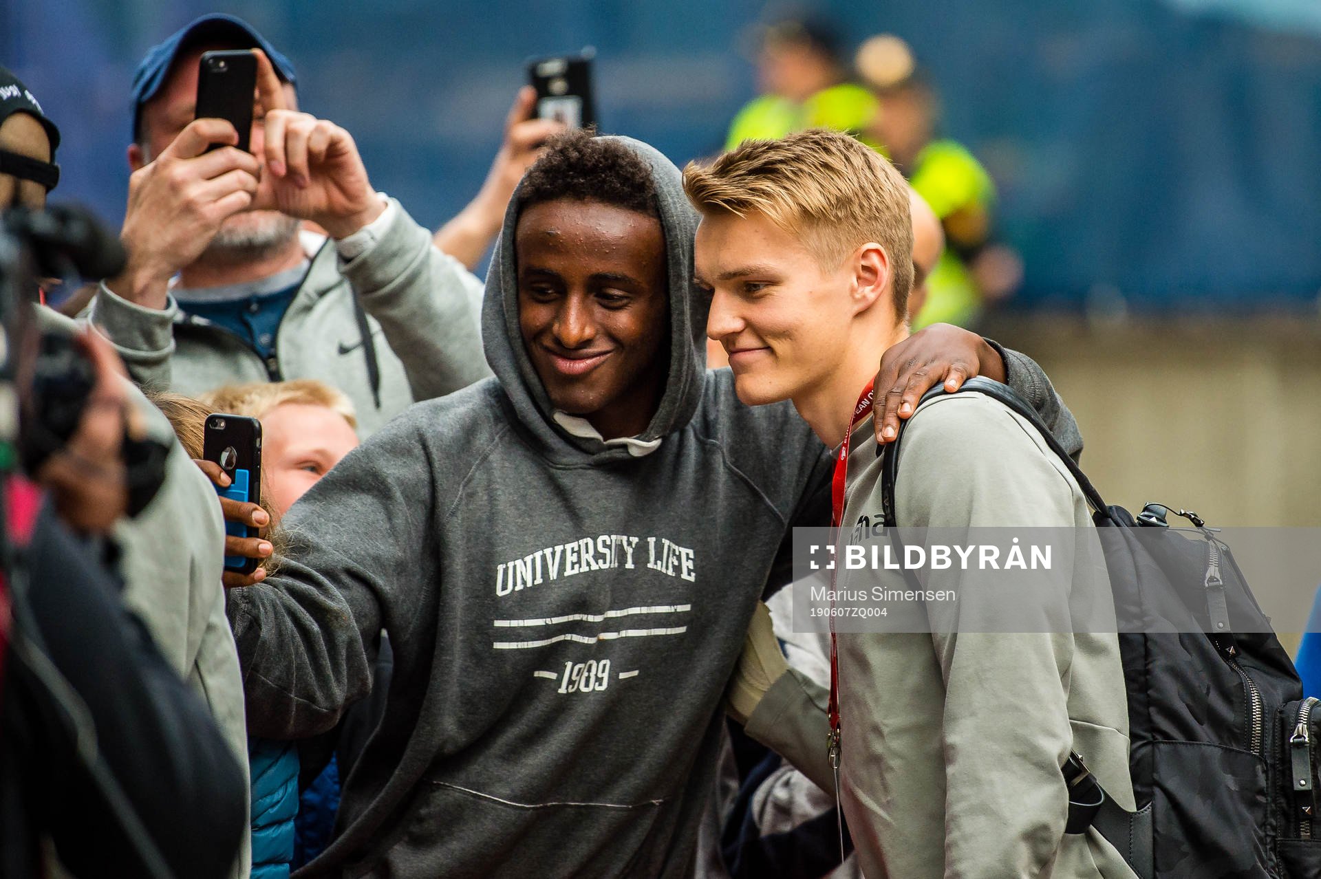 Martin Ødegaard of Norway takes a selfie with a fan