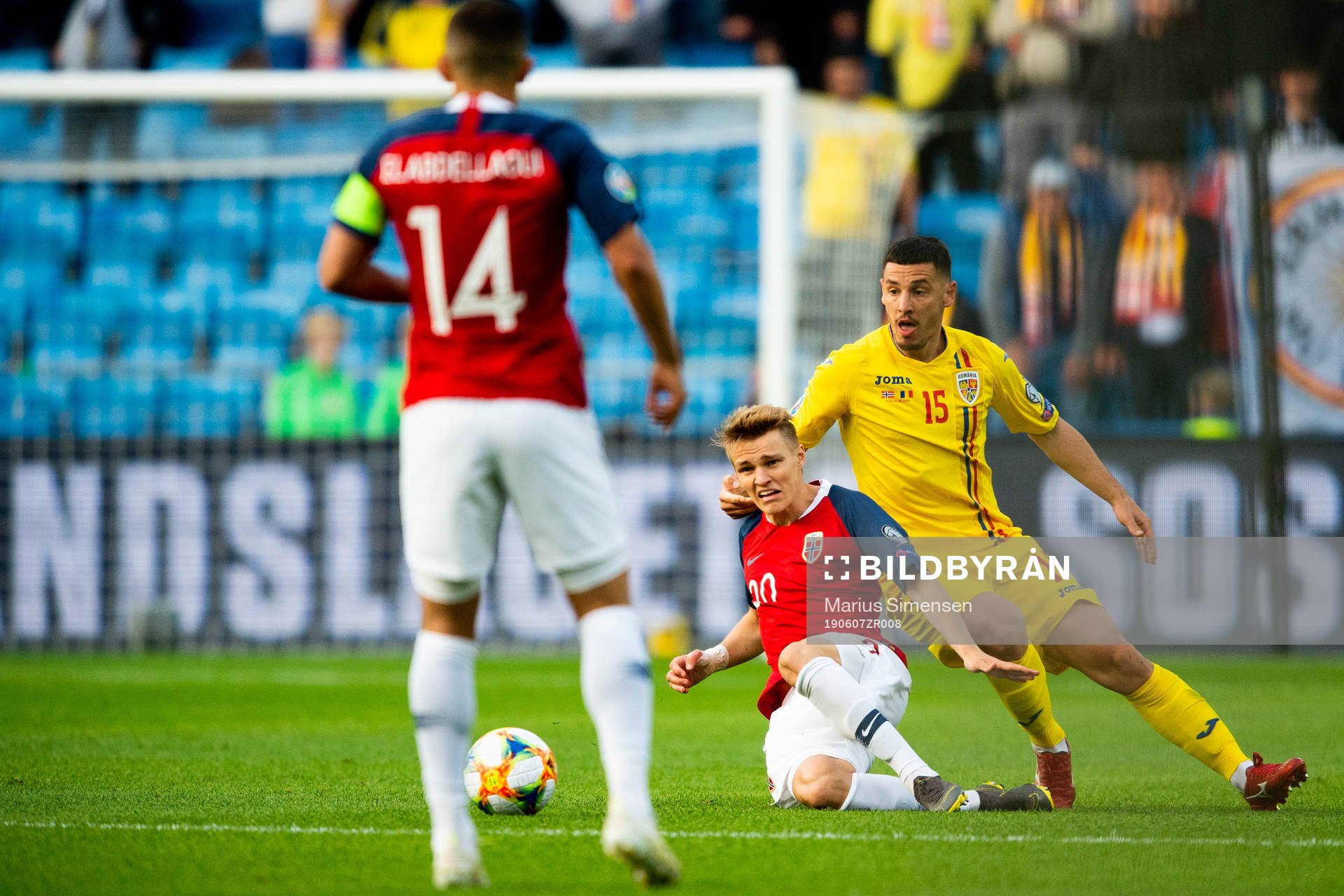 Martin Ødegaard of Norway and Paul Anton of Romania