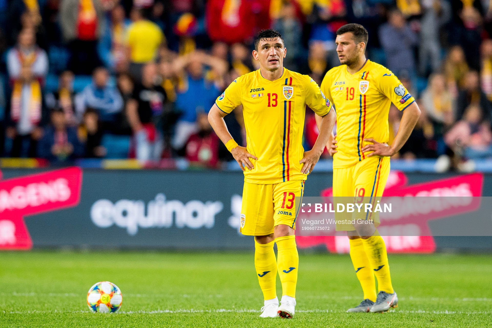 Claudiu Keseru and George Tucudean of Romania look dejected