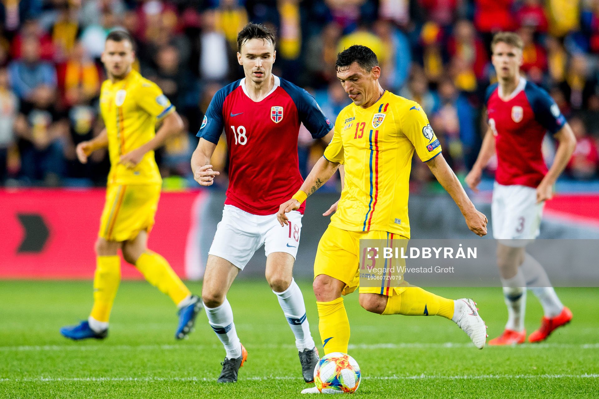 Ole Kristian Selnæs of Norway and Claudiu Keseru of Romania during the UEFA Euro Qualifier football match between Norway and Romania on June 7, 2019 in Oslo.