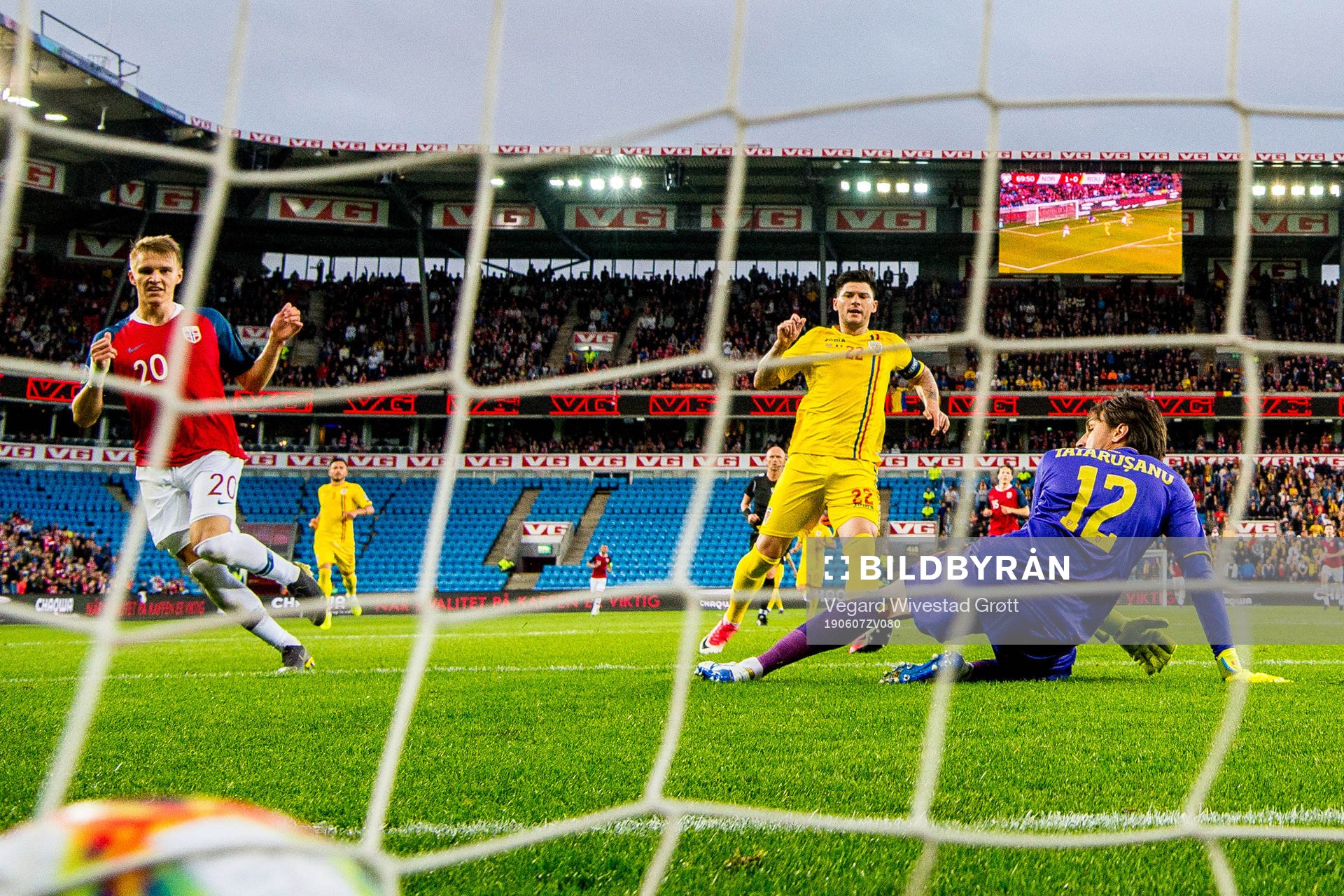 Martin Ødegaard of Norway scores 2-0 behind Cristian