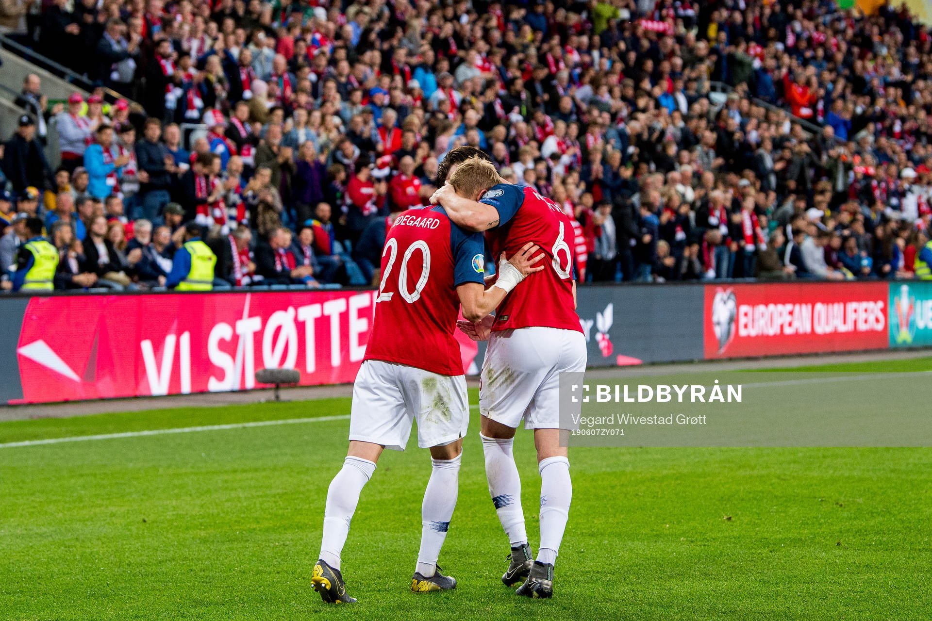 Martin Ødegaard of Norway celebrates with teammate Håvard Nordtveit after scoring 2-0 during the UEFA Euro Qualifier football match between Norway and Romania on June 7, 2019 in Oslo.