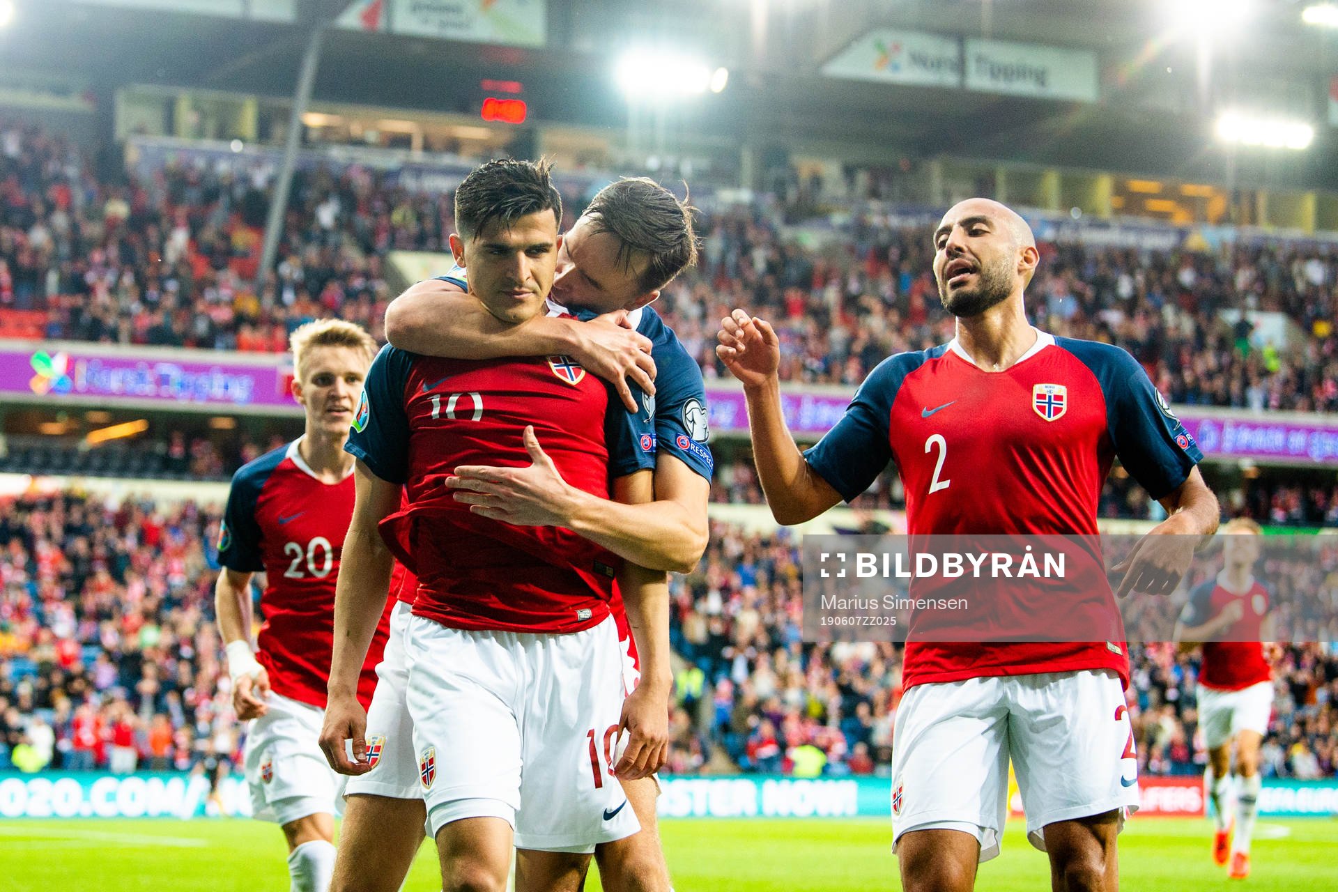 Tarik Elyounoussi of Norway celebrates with his teammates Martin Ødegaard, Ole Kristian Selnæs and Haitam Aleesami after scoring 1-0 during the UEFA Euro Qualifier football match between Norway and Romania on June 7, 2019 in Oslo.