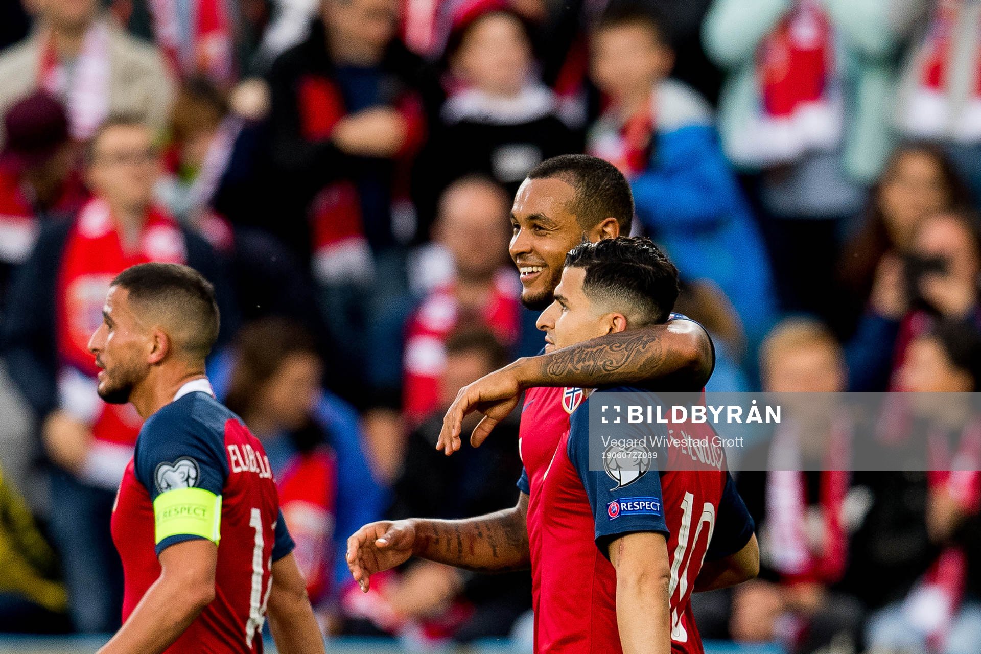 Tarik Elyounoussi of Norway celebrates with teammate Joshua