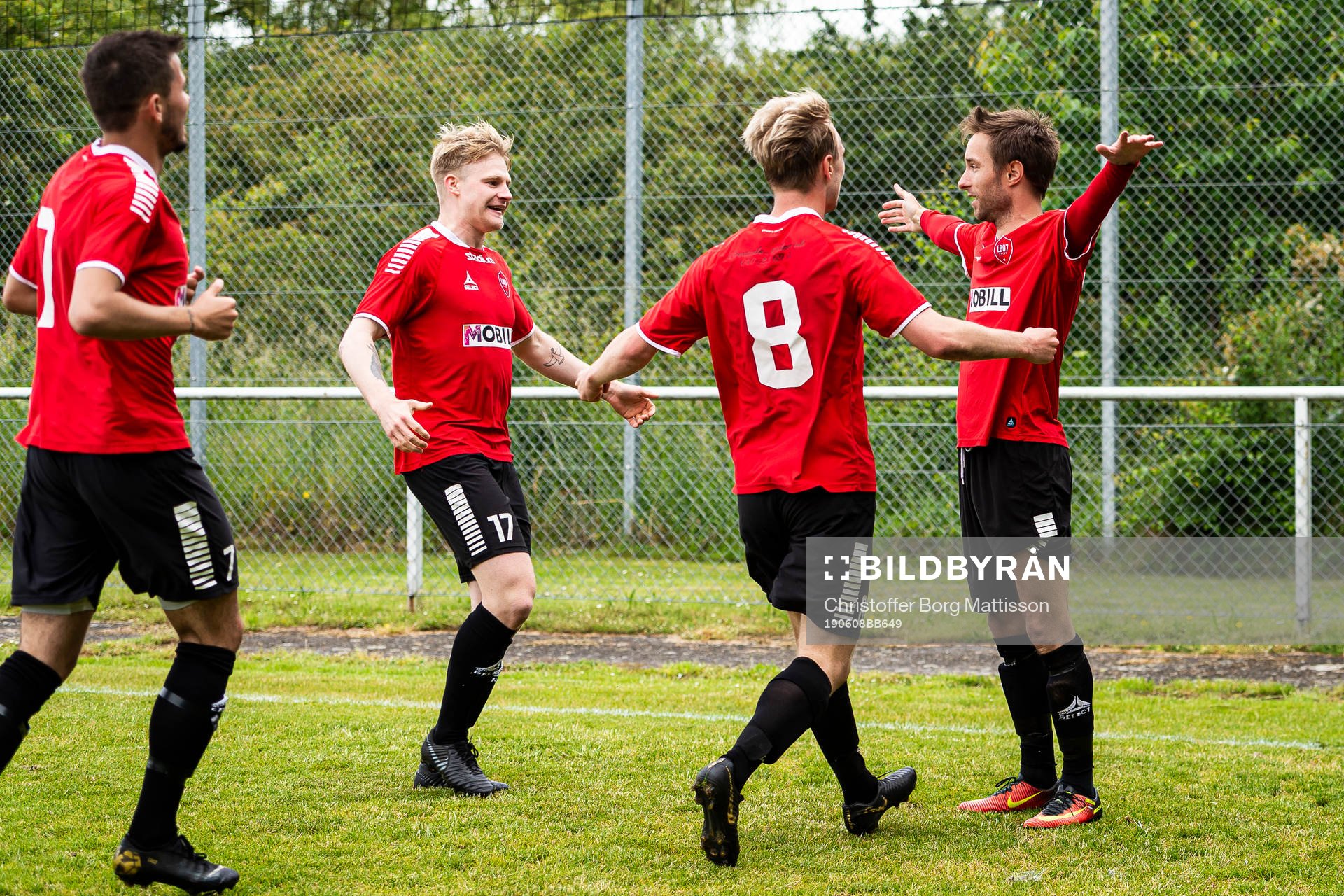 Limhamn Bunkeflos Sebastian Rask, Max Forslund, Simon Thoresson jublar med Daniel Jovanovic efter 1-0 målet under fotbollsmatchen i Division 3 Södra Götaland mellan Limhamn Bunkeflo och Tomelilla den 8 juni 2019 i Malmö.