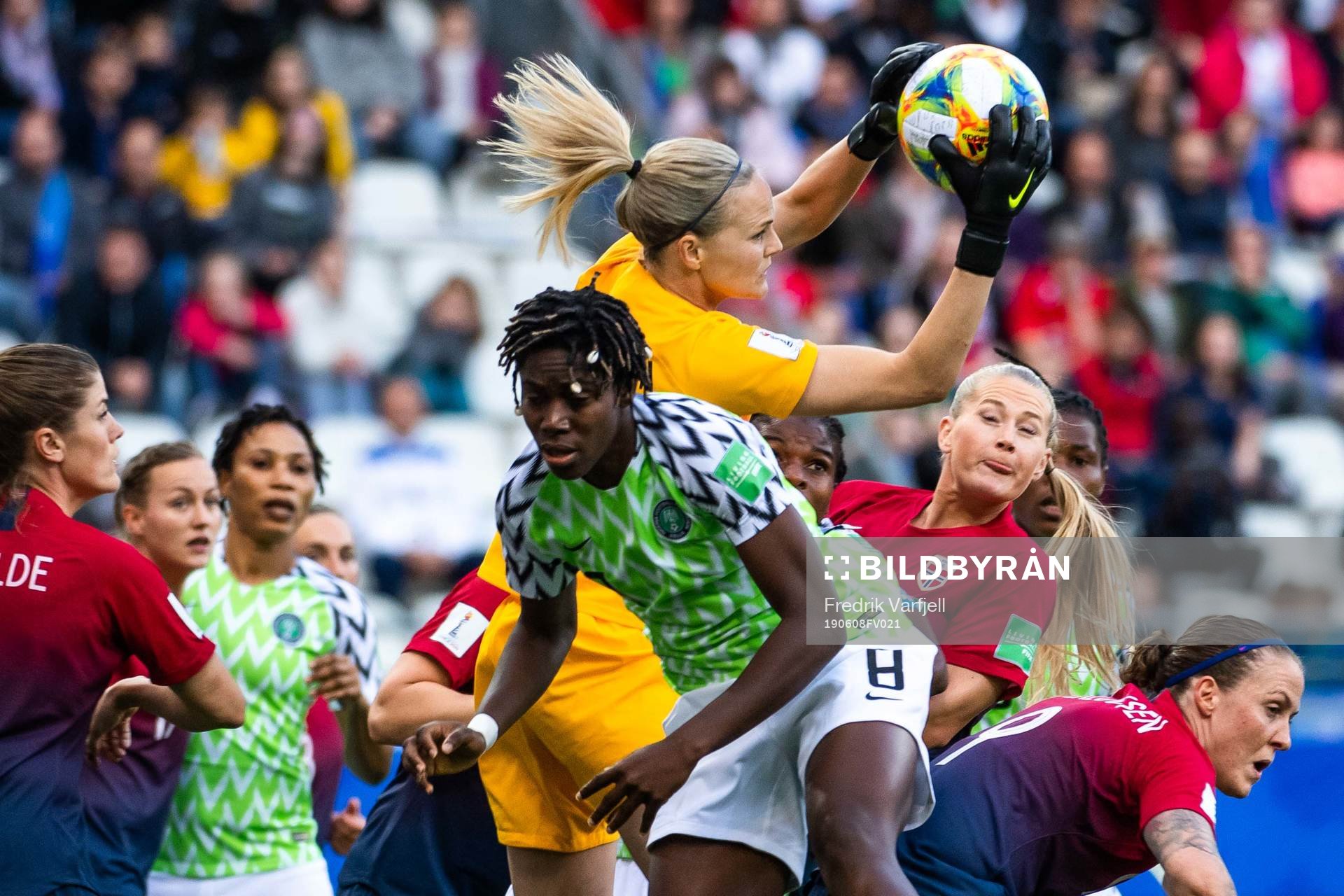 Asisat Oshoala of Nigeria and goalkeeper Ingrid Hjelmseth