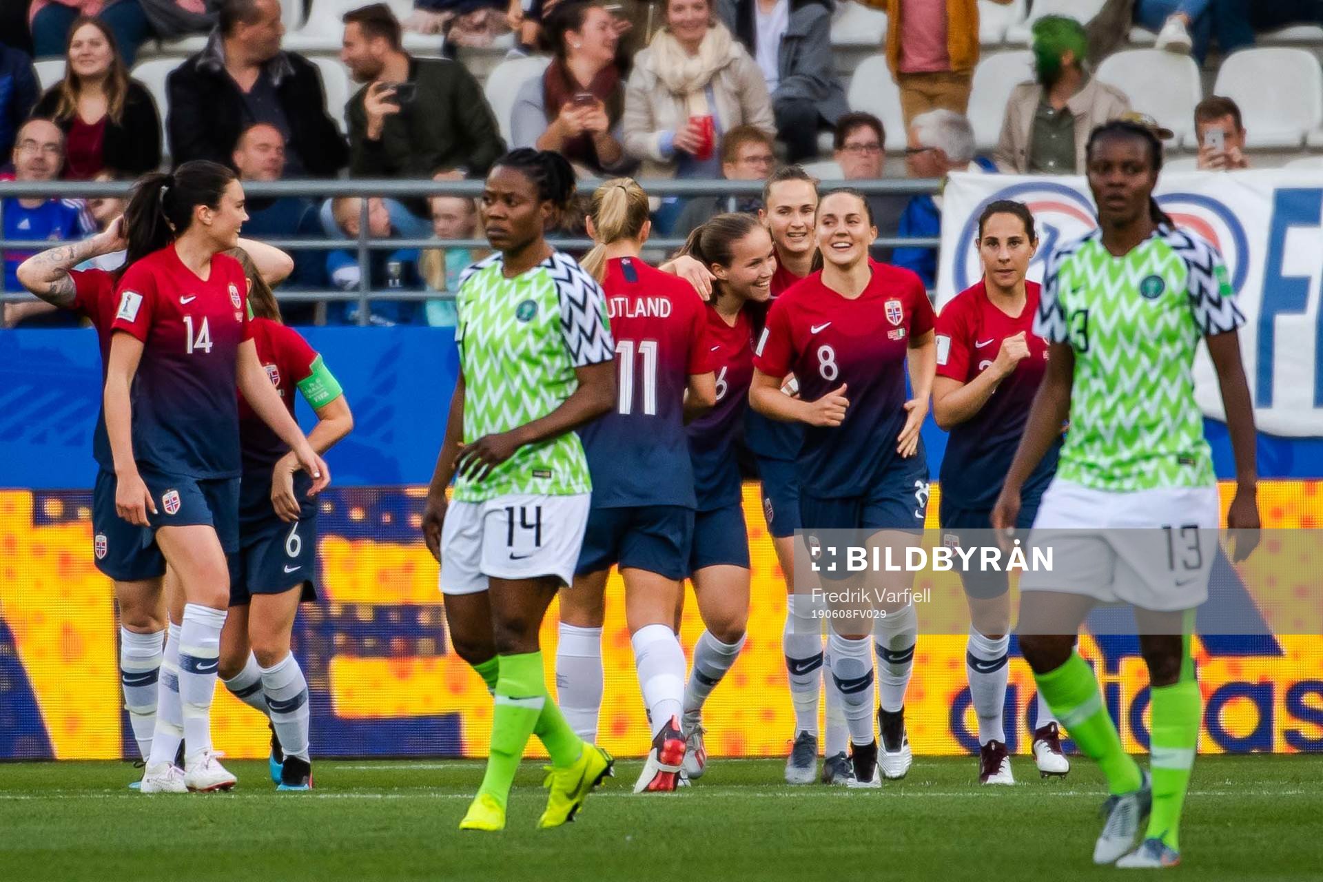 Guro Reiten of Norway celebrate with teammates