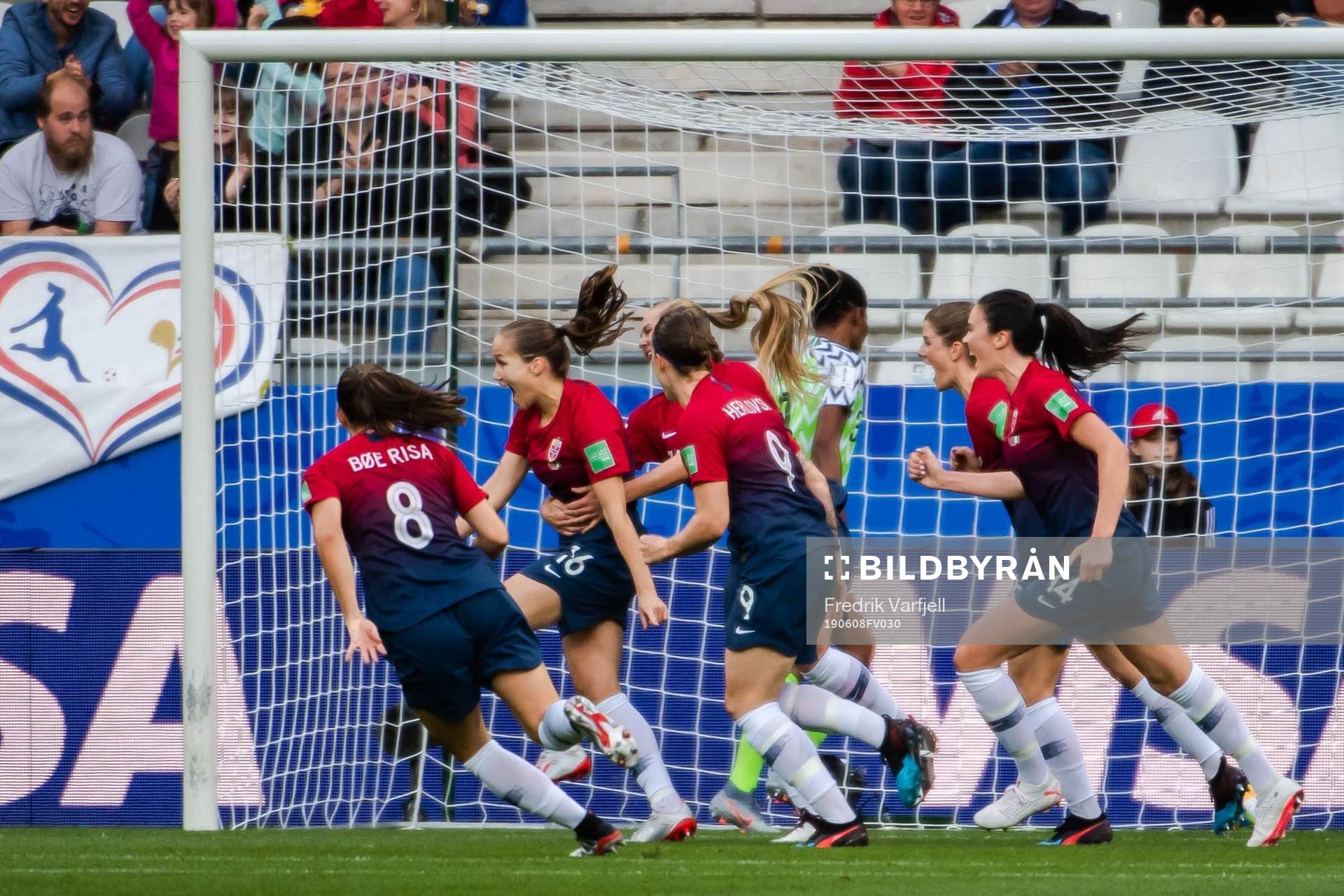 Guro Reiten of Norway celebrate with teammates