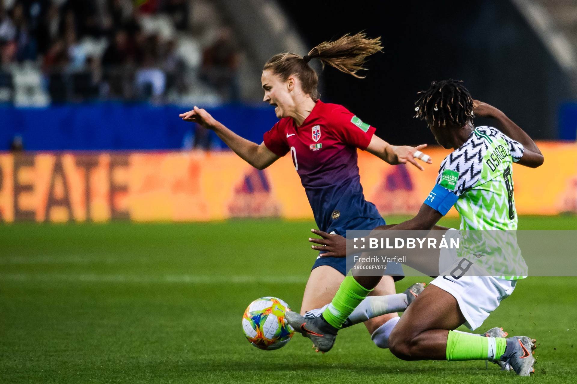 Caroline Graham Hansen of Norway and Asisat Oshoala of Nigeria during the FIFA Women's World Cup match between Norway and Nigeria on June 8, 2019 in Reims.