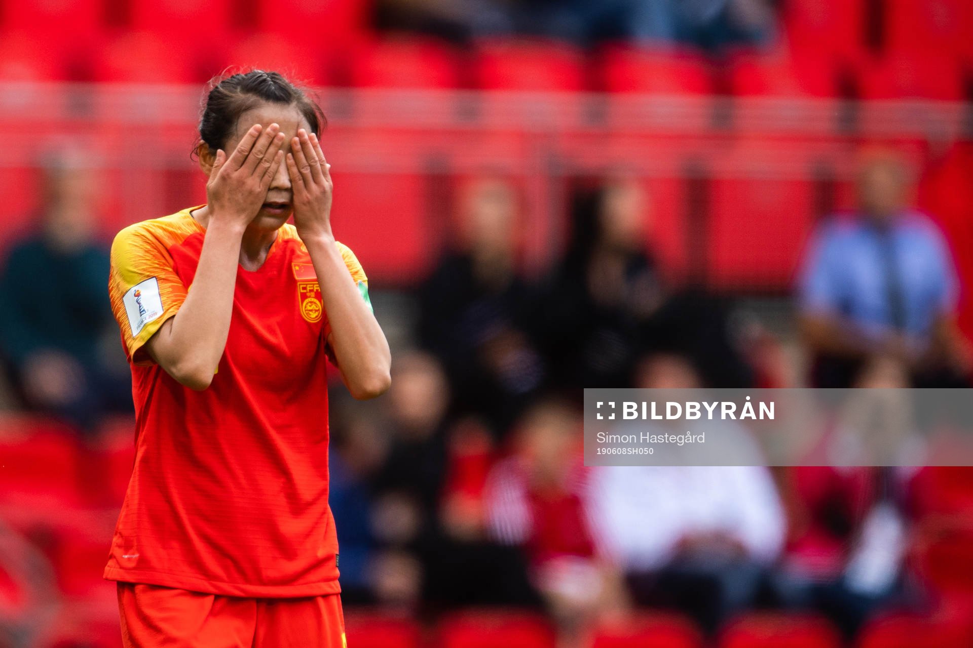 Li Yang of China looks dejected