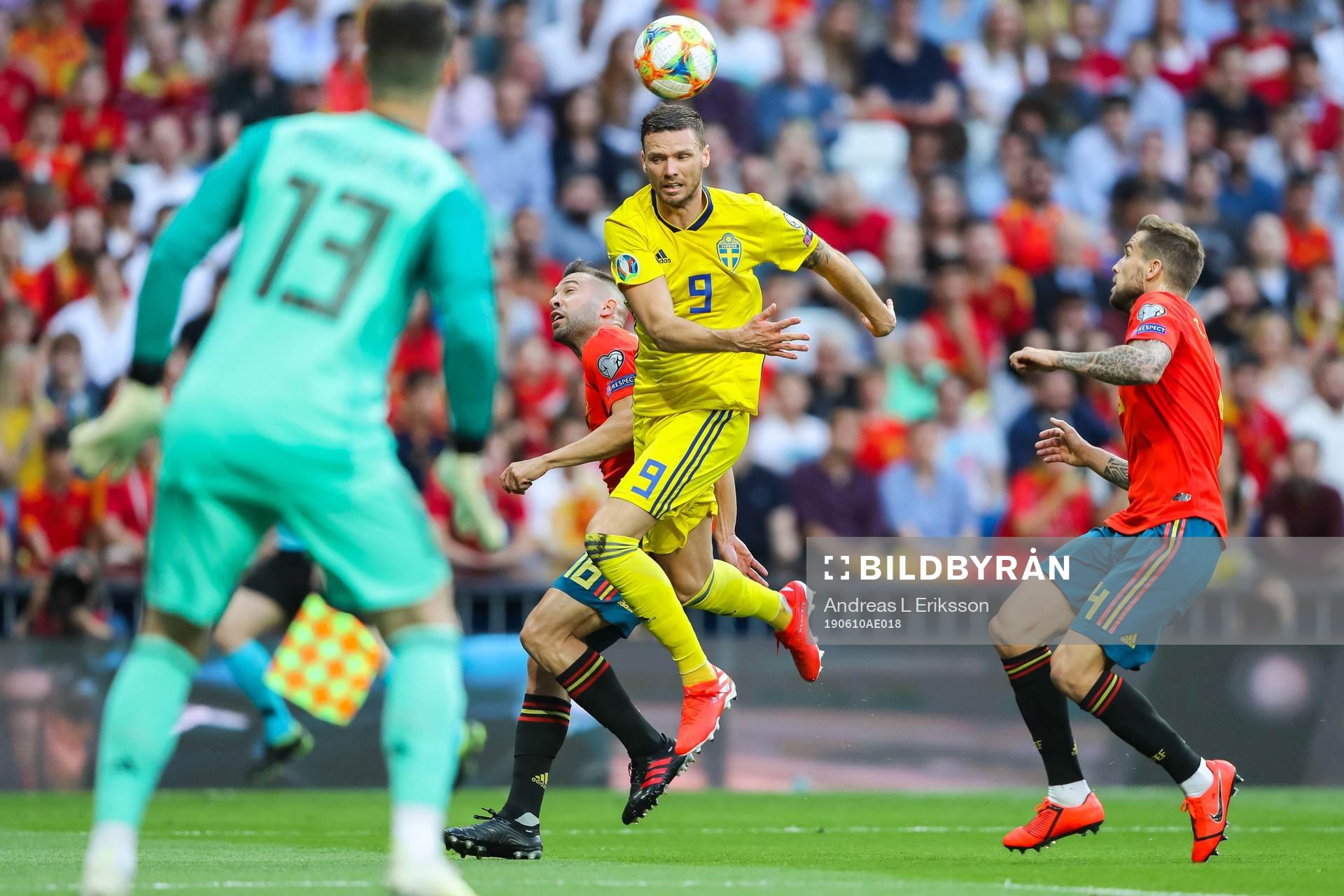 Marcus Berg of Sweden against Jordi Alba and Inigo