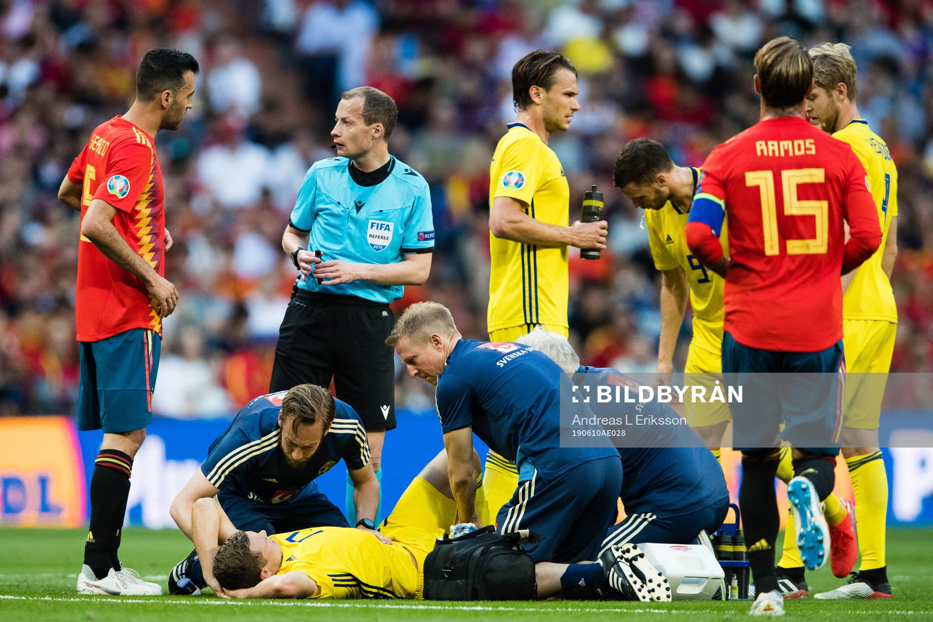 Viktor Claesson of Sweden receives help of the pitch