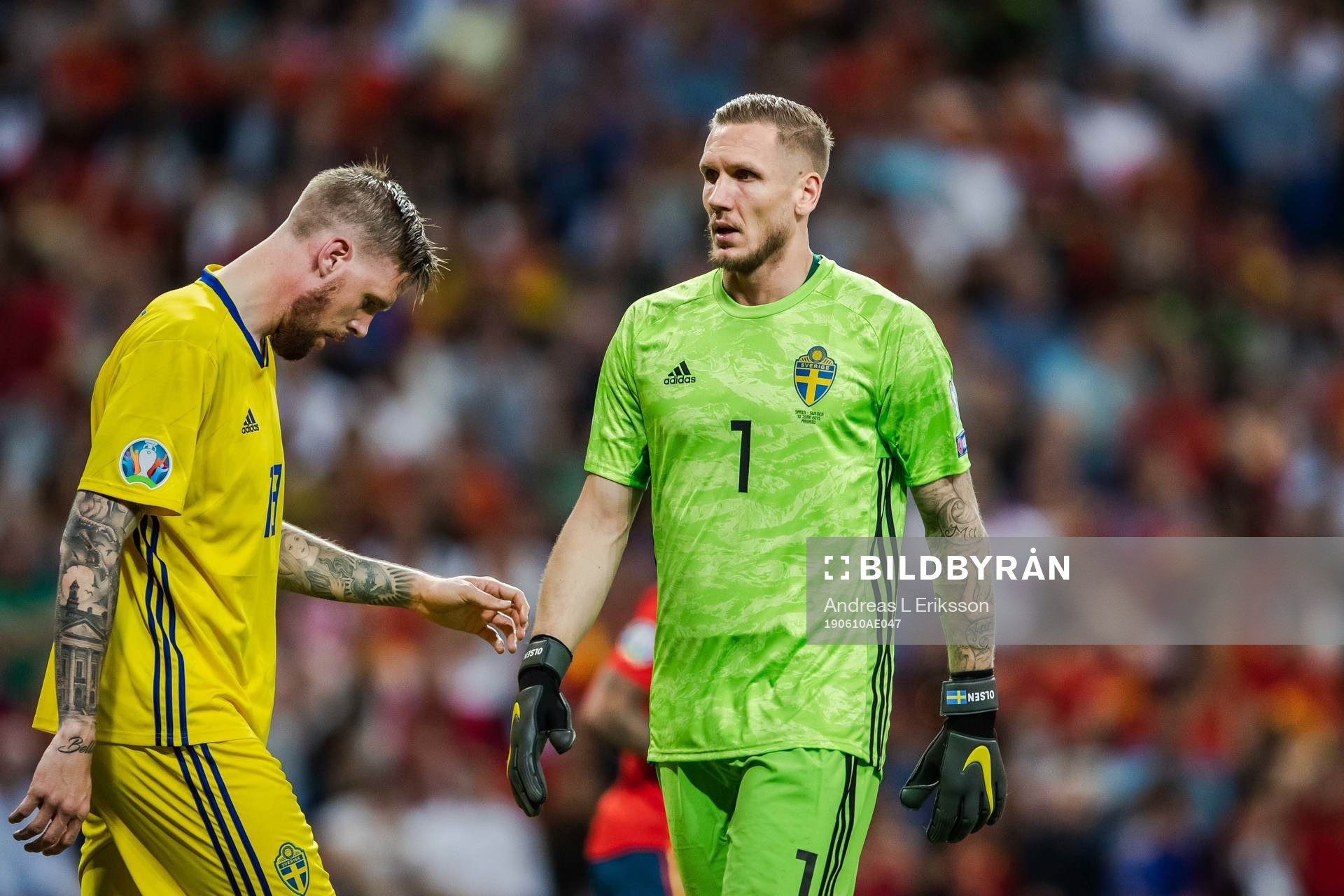 Pontus Jansson of Sweden and goalkeeper Robin Olsen of