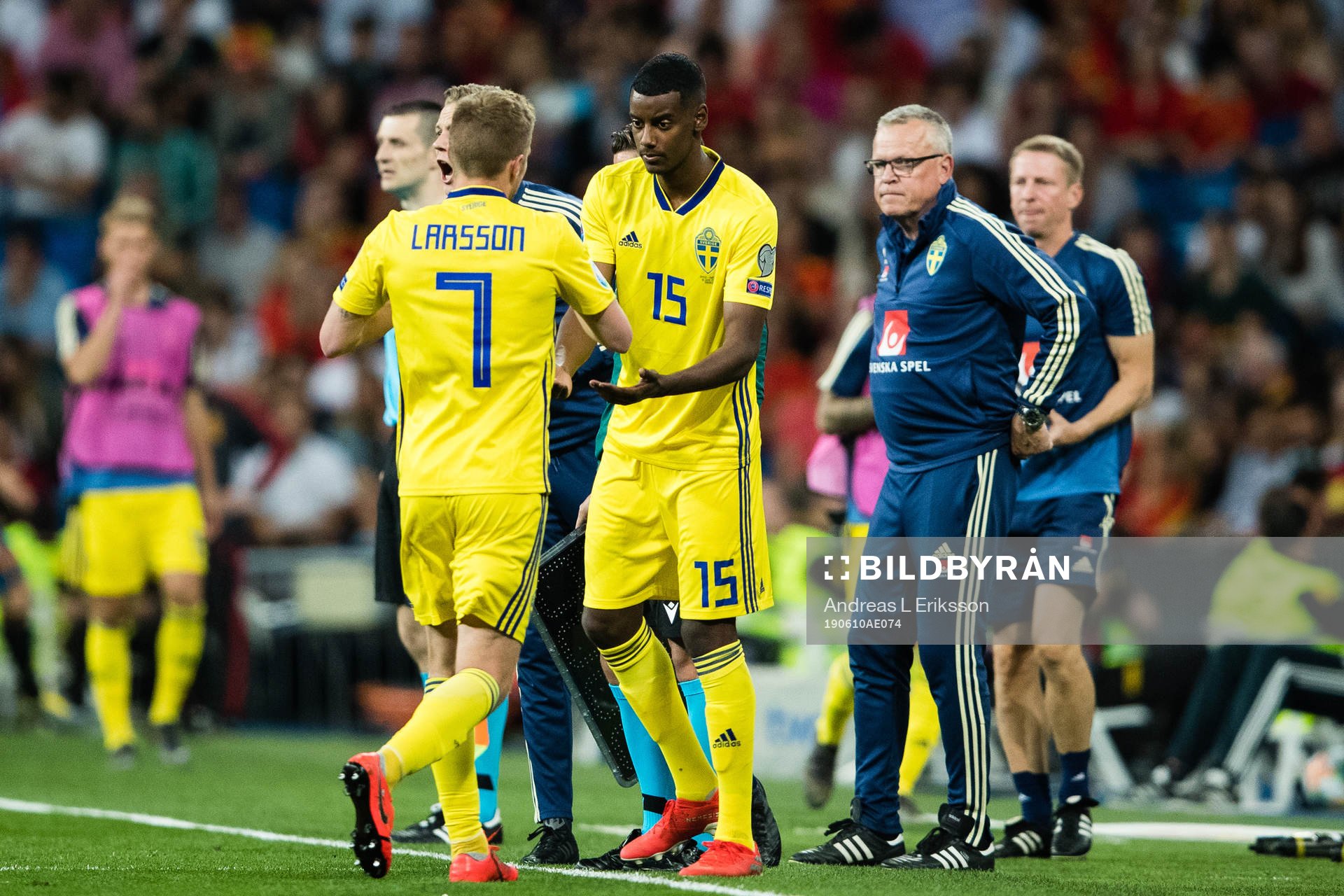 Sebastian Larsson chages with Alexander Isak