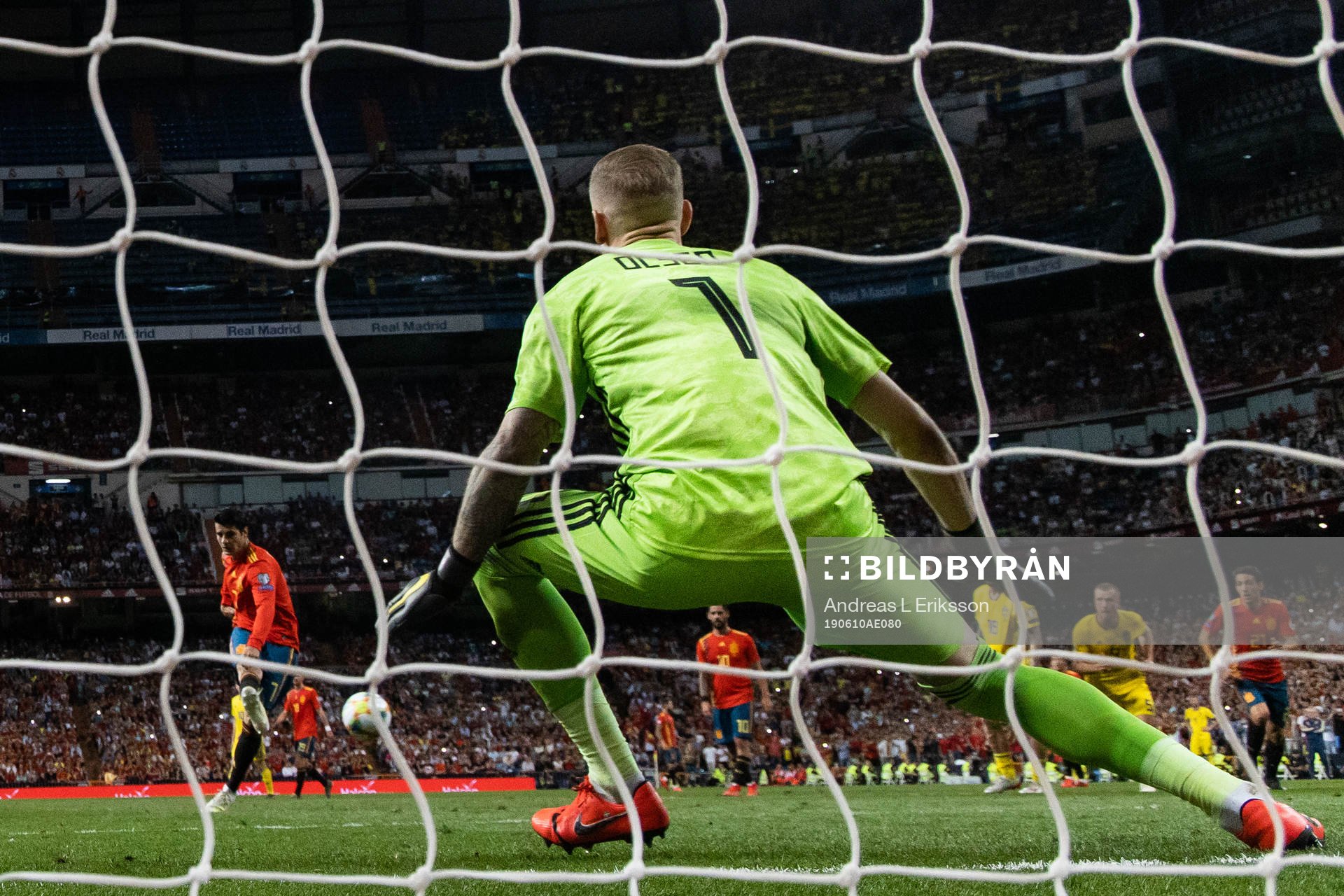 Alvaro Morata of Spain scores 2-0 behind goalkeeper Robin