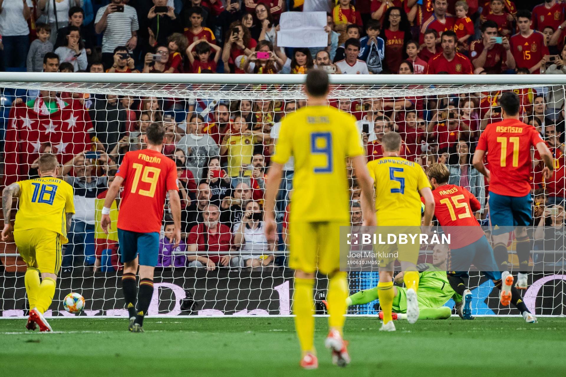 Sergio Ramos of Spain scores 1-0 behind goalkeeper Robin