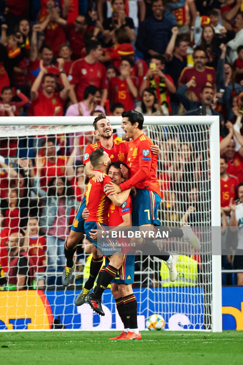 Mikel Oyarzabal of Spain celebrates with teammates