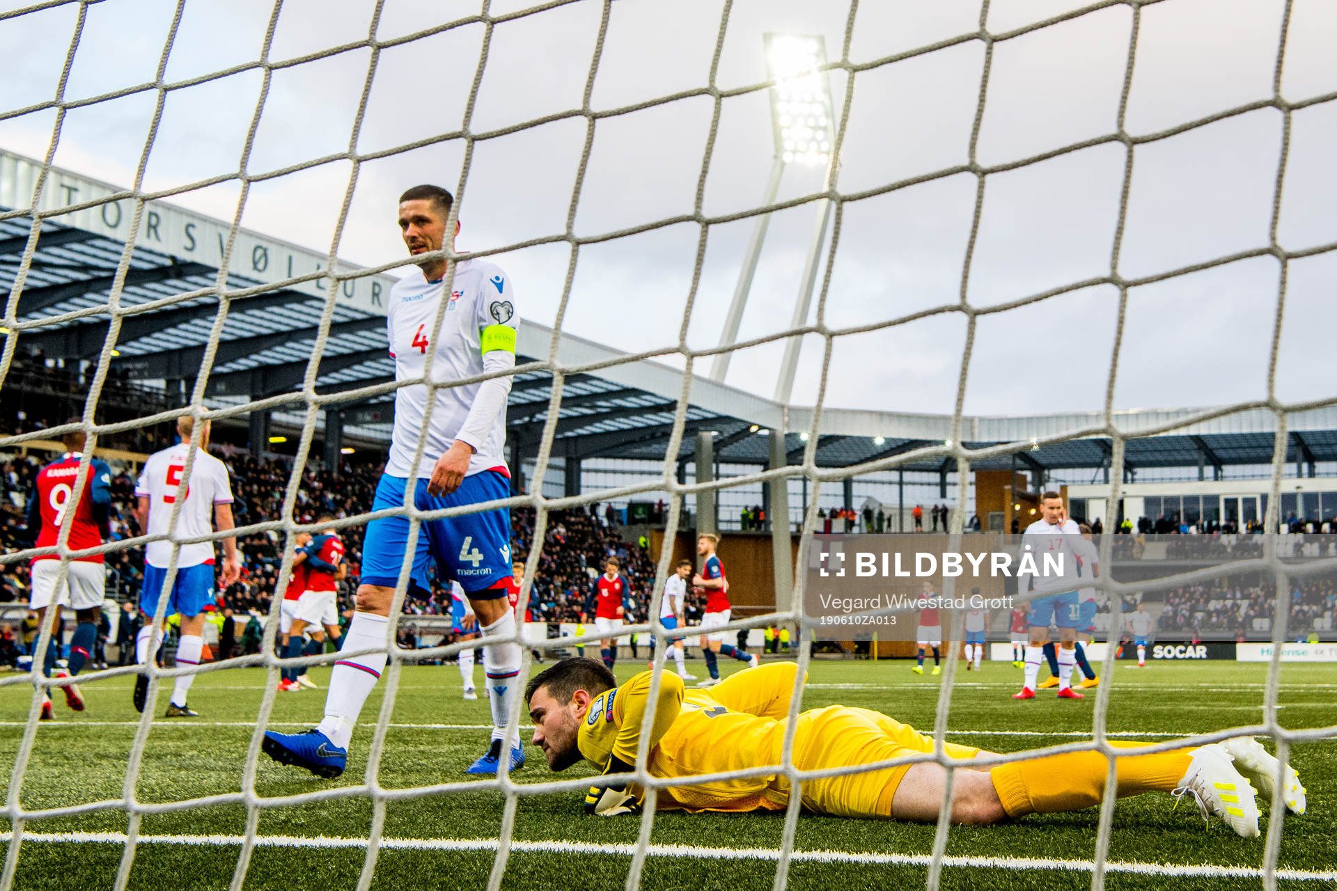 Atli Gregersen and goalkeeper Teitur Gestsson of Faroe