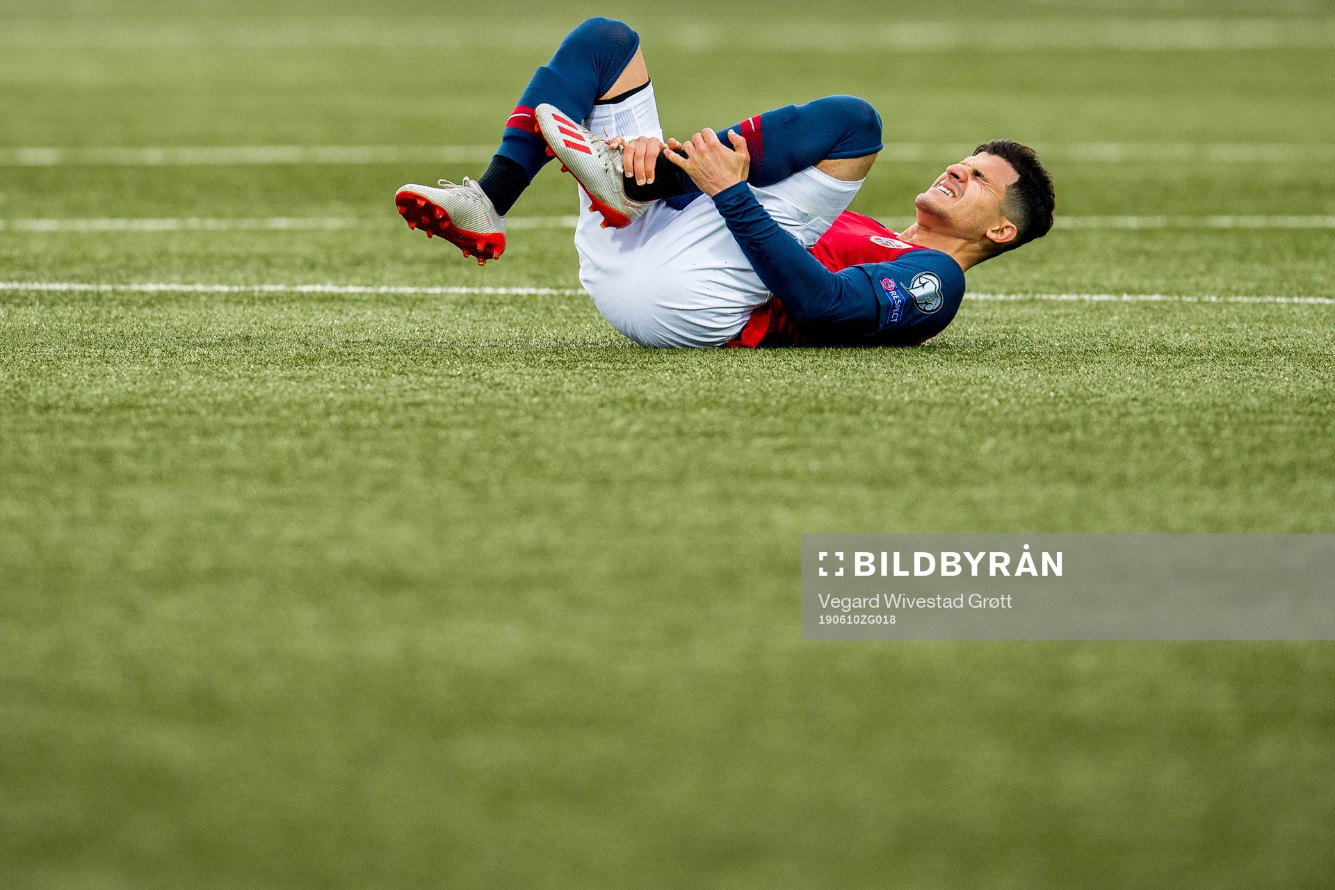 Tarik Elyounoussi of Norway lies down