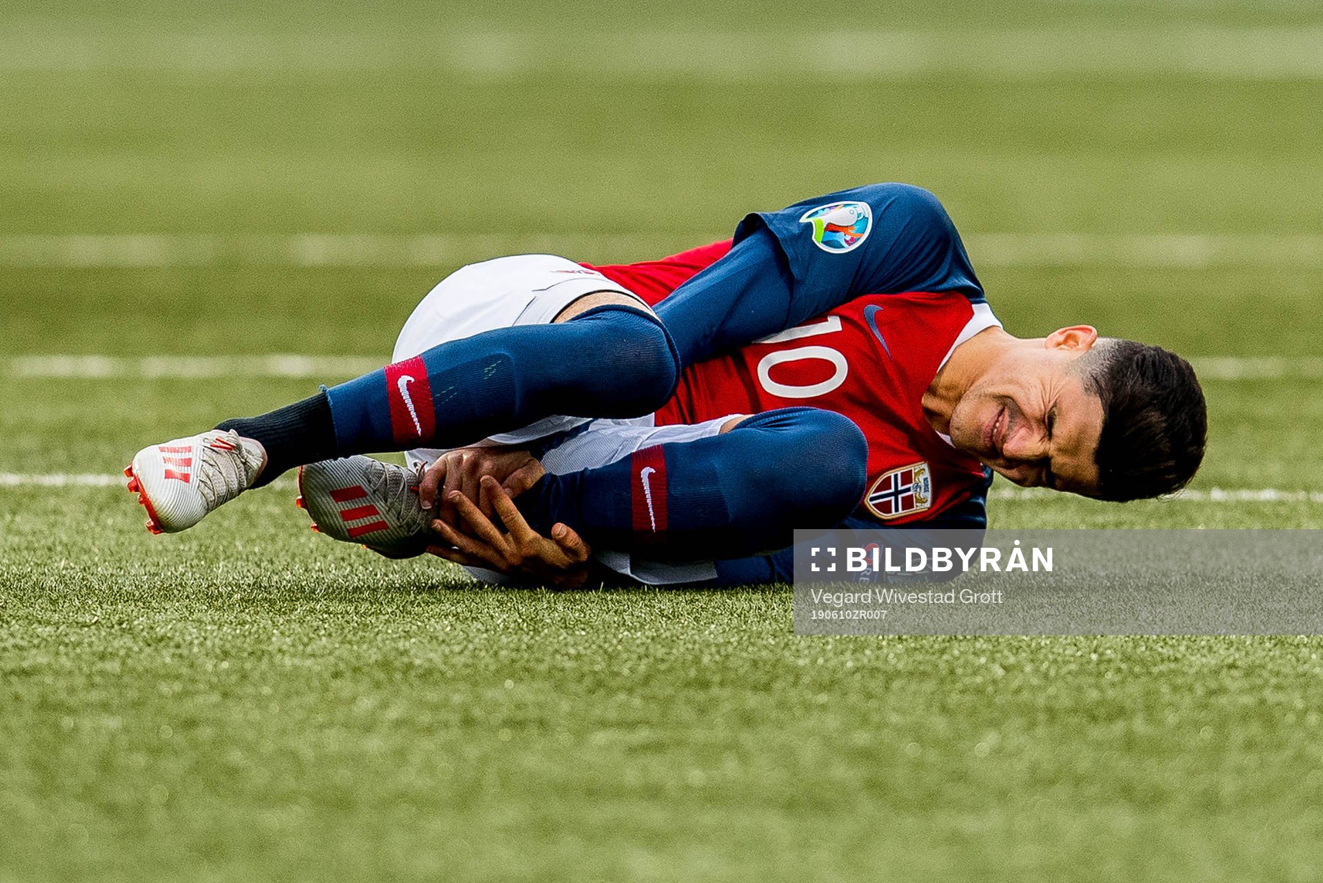 Tarik Elyounoussi of Norway lies down