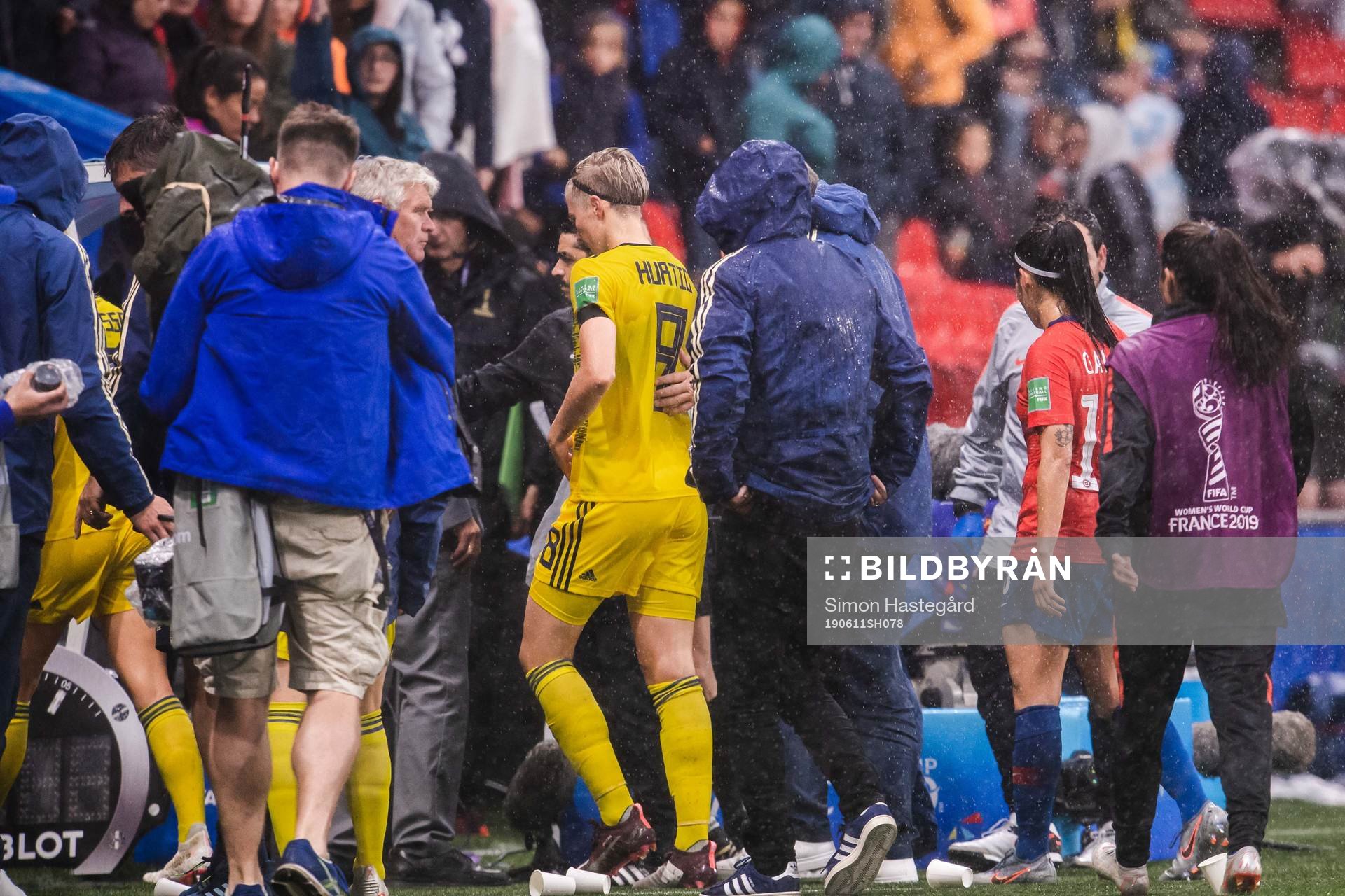Lina Hurtig of Sweden leaves the pitch due to severe