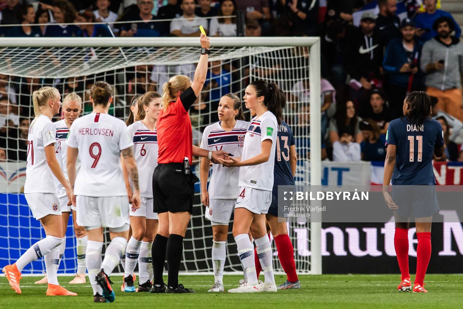 Ingrid Syrstad Engen of Norway is shown a yellow card by Referee Bibiana Steinhaus after a situation with Marion Torrent of France (not pictured) during the FIFA Women's World Cup match between France and Norway on June 12, 2019 in Nice.