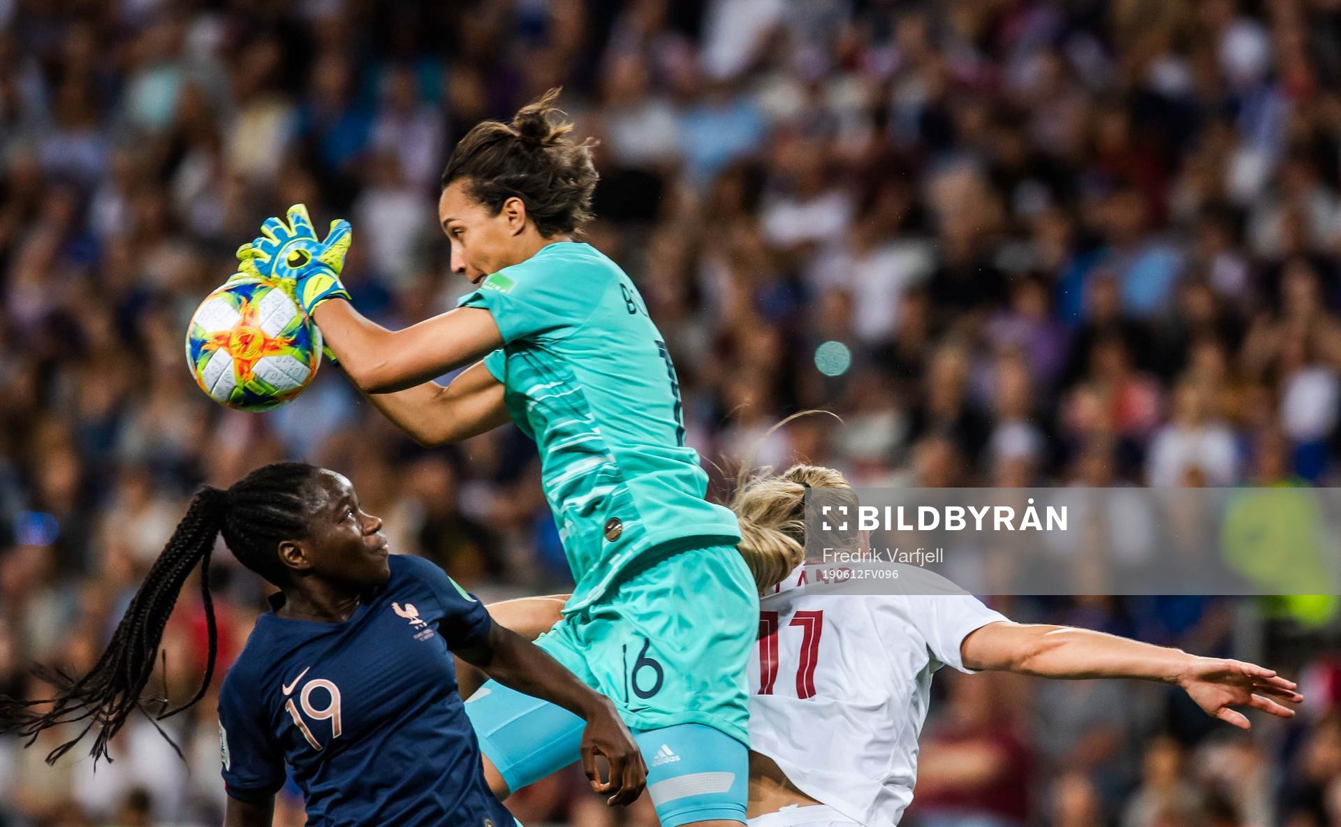 Griedge Mbock Bathy and goalkeeper Sarah Bouhaddi of France
