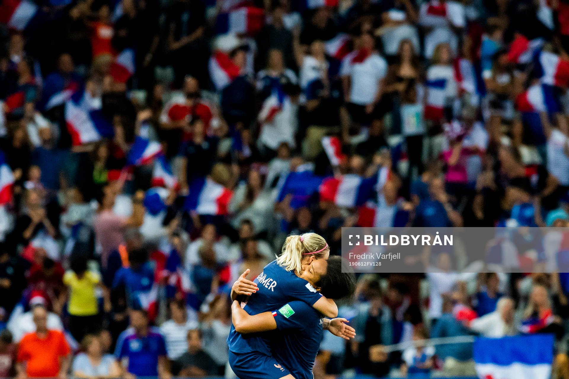 Eugénie Le Sommer and Wendie Renard celebrate