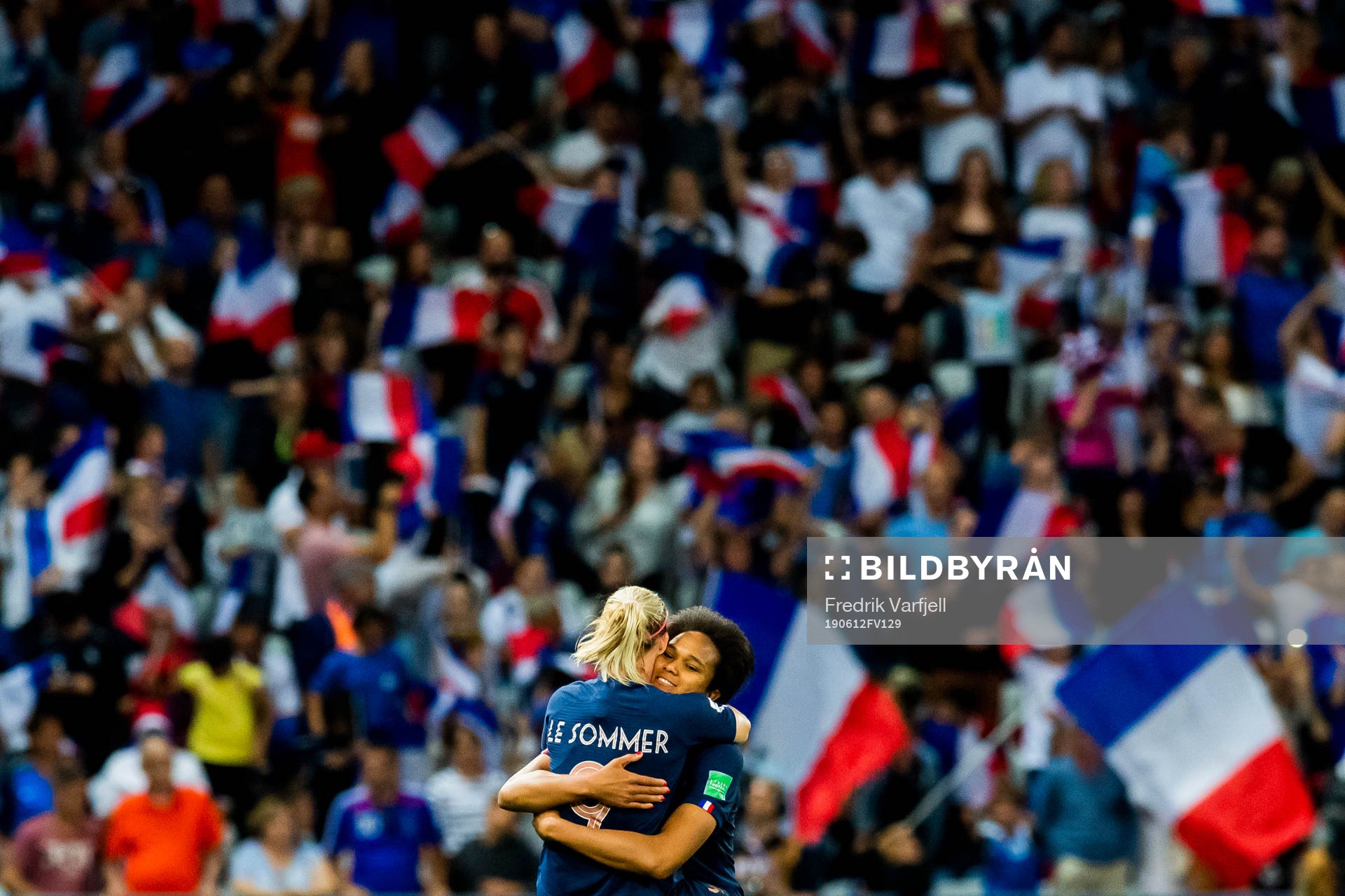 Eugénie Le Sommer and Wendie Renard celebrate
