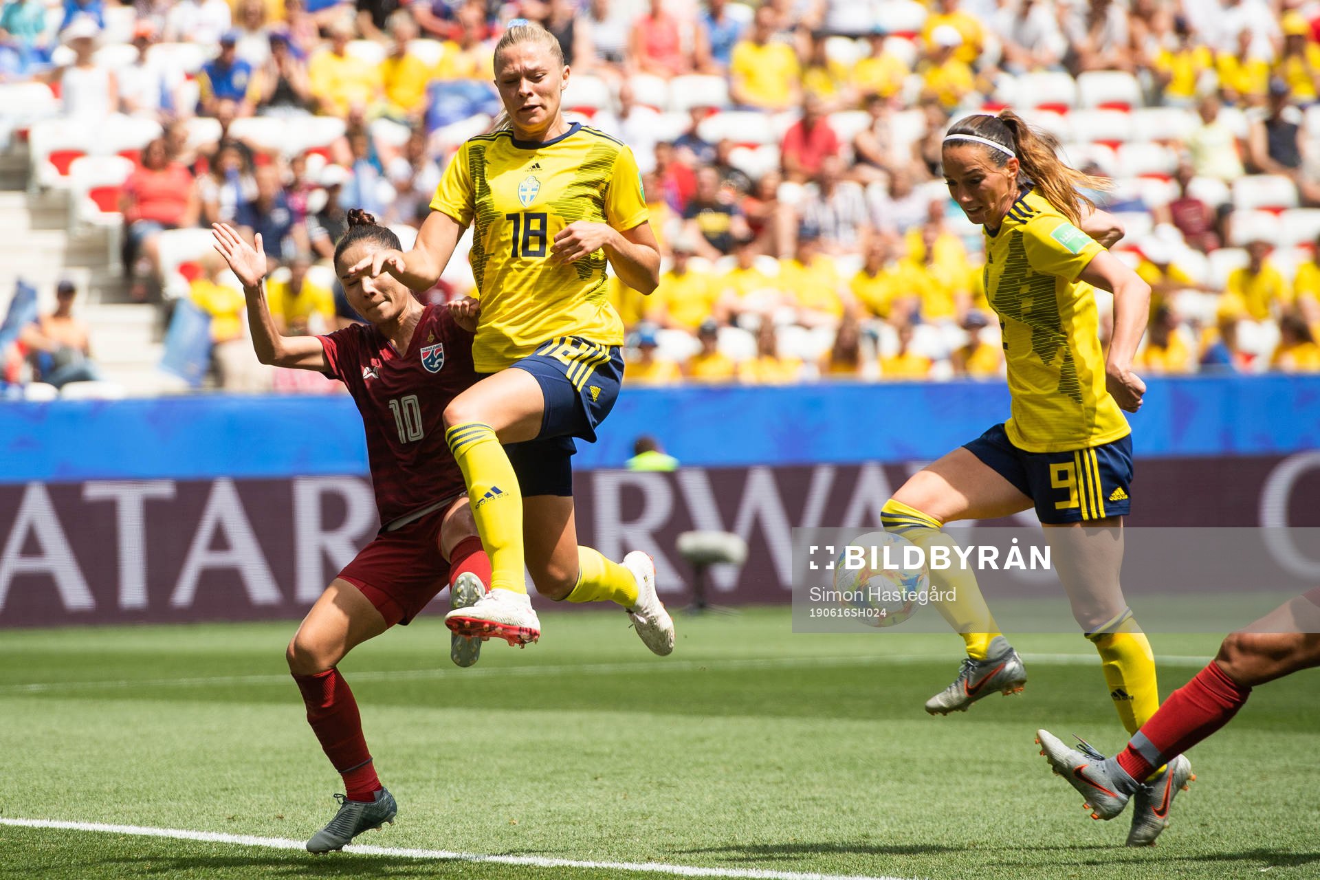 Sunisa Srangthaisong of Thailand compete for the ball with