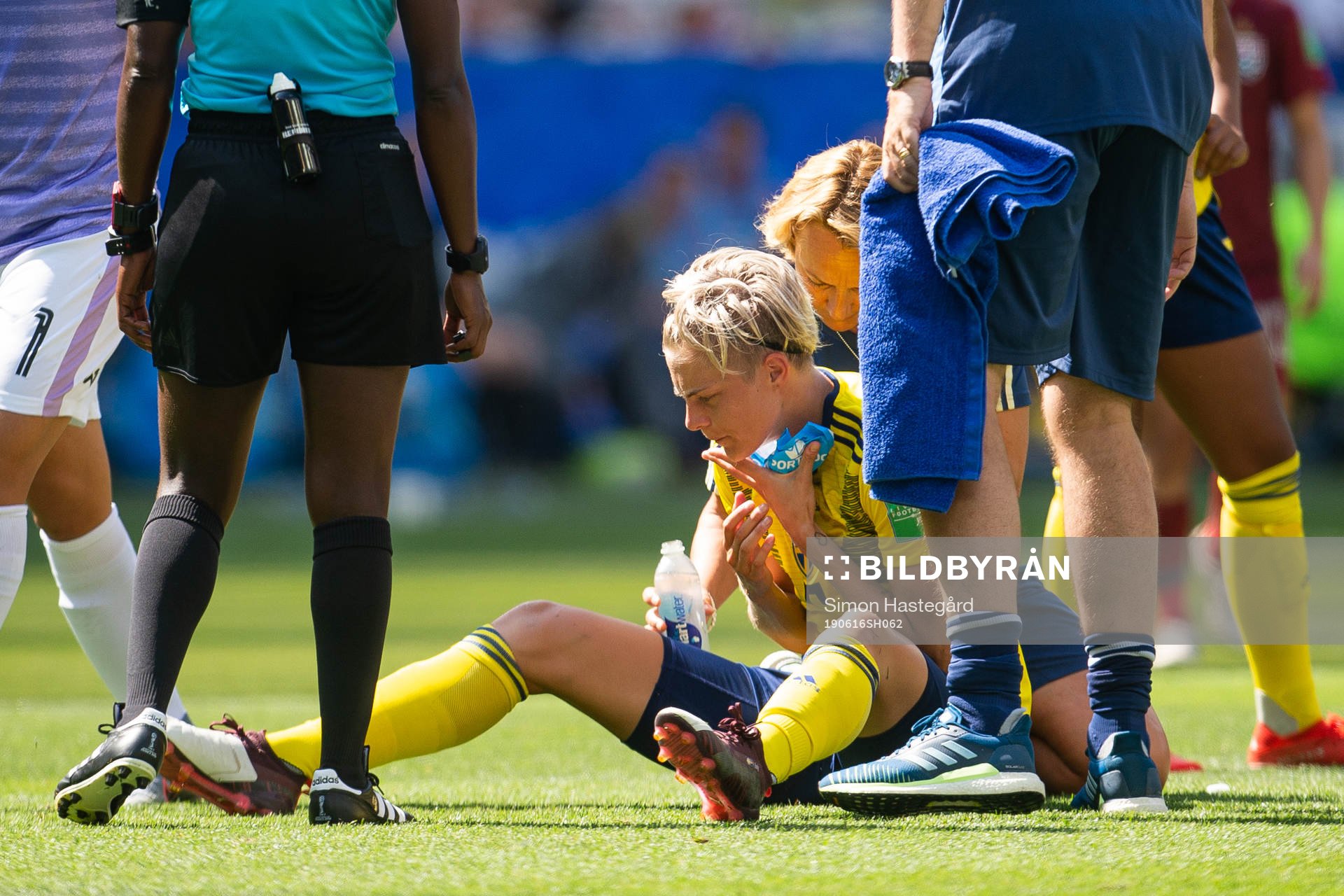Lina Hurtig of Sweden receives medical attention