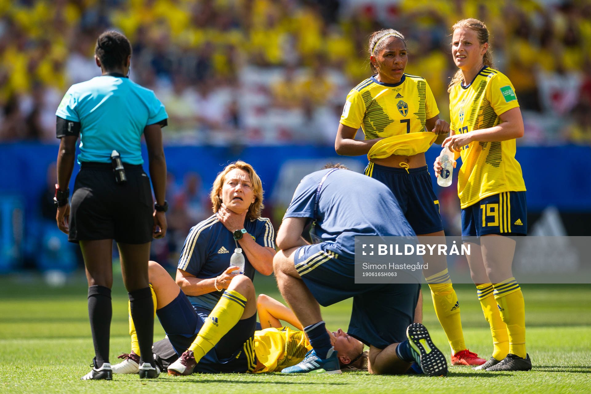 Lina Hurtig of Sweden receives medical attention