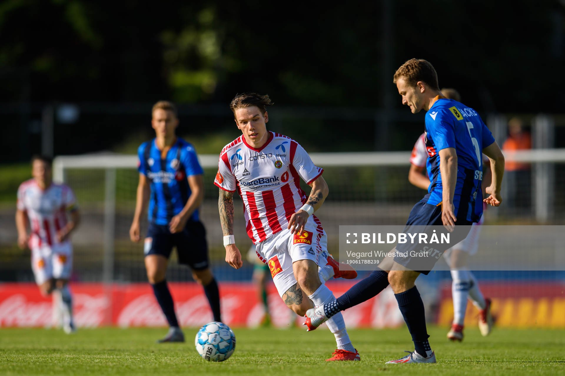 Robert Taylor of Tromsø and Steinar Ryen Strømnes of Stabæk during the Eliteserien football match between Stabæk and Tromsø on June 17, 2019 in Bekkestua.
