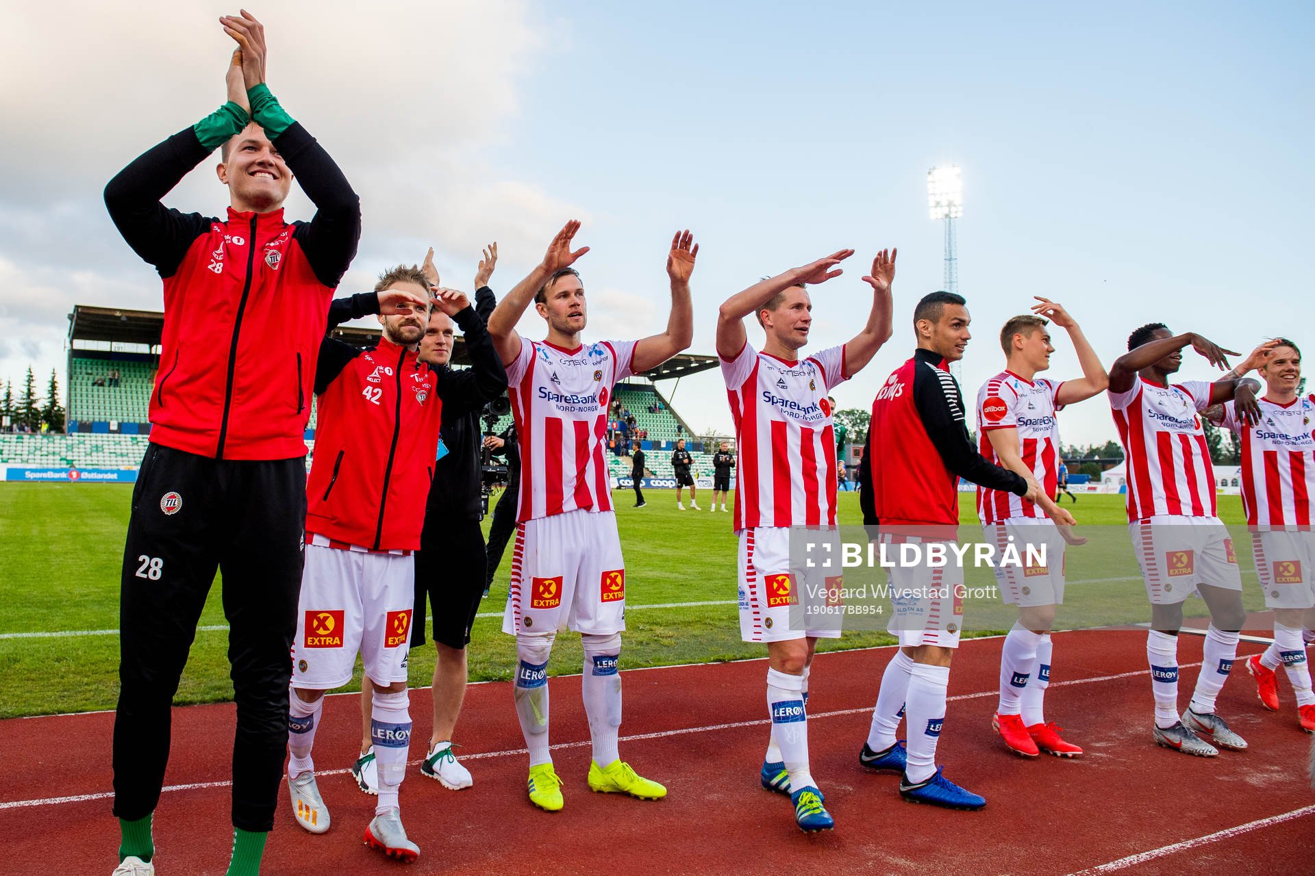 Anders Jenssen, Morten Gamst Pedersen and the players of Tromsø celebrate after the Eliteserien football match between Stabæk and Tromsø on June 17, 2019 in Bekkestua.