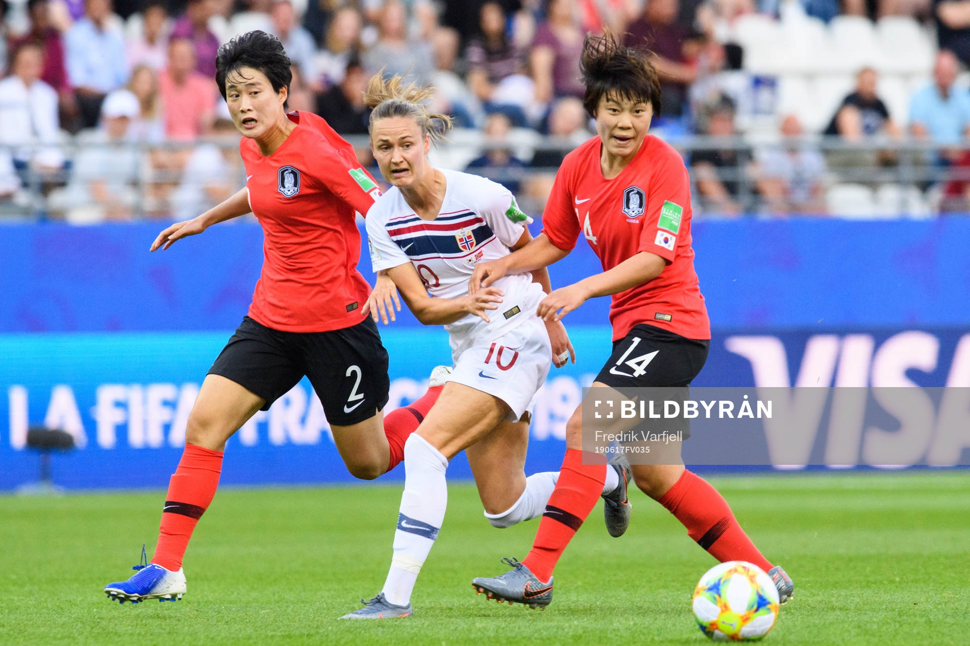 Caroline Graham Hansen of Norway against Lee Eunmi and Shin Damyeong of South Korea during the FIFA Women's World Cup match between South Korea and Norway on June 17, 2019 in Reims.