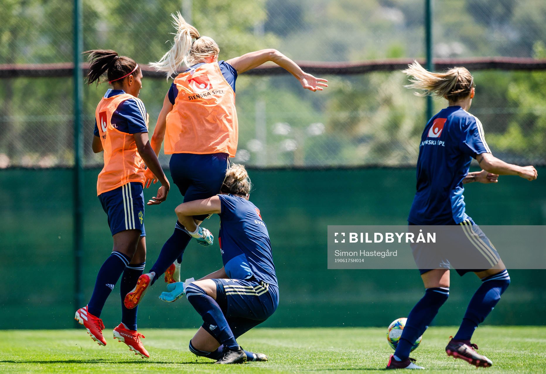 Sofia Jakobsson and goalkeeper Jennifer Falk of Sweden