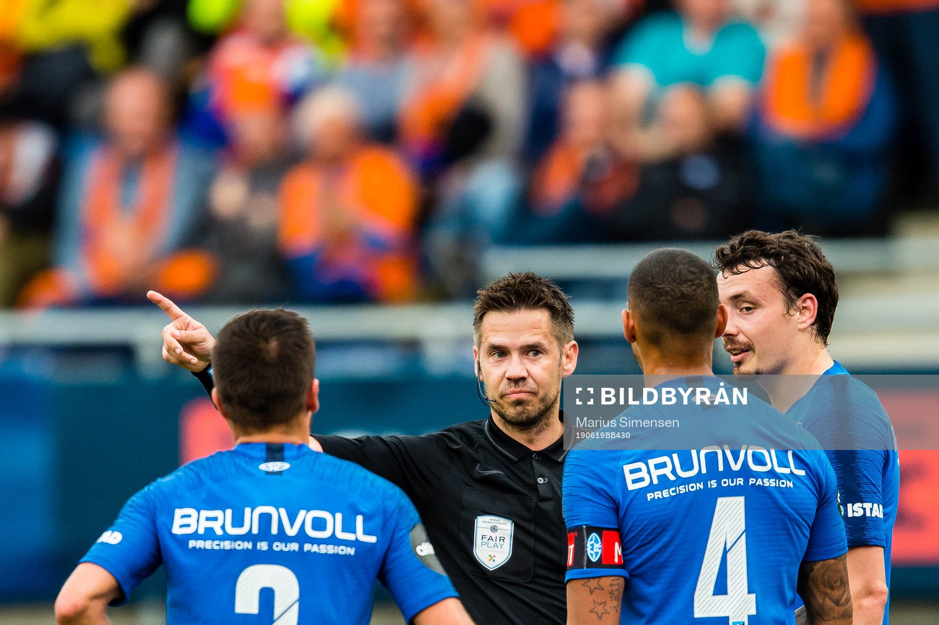 Lunan Ruben Gabrielsen of Molde gets a red card by Tom Harald Hagen, referee, during the cup match between Aalesund and Molde on June 19, 2019 in Ålesund.